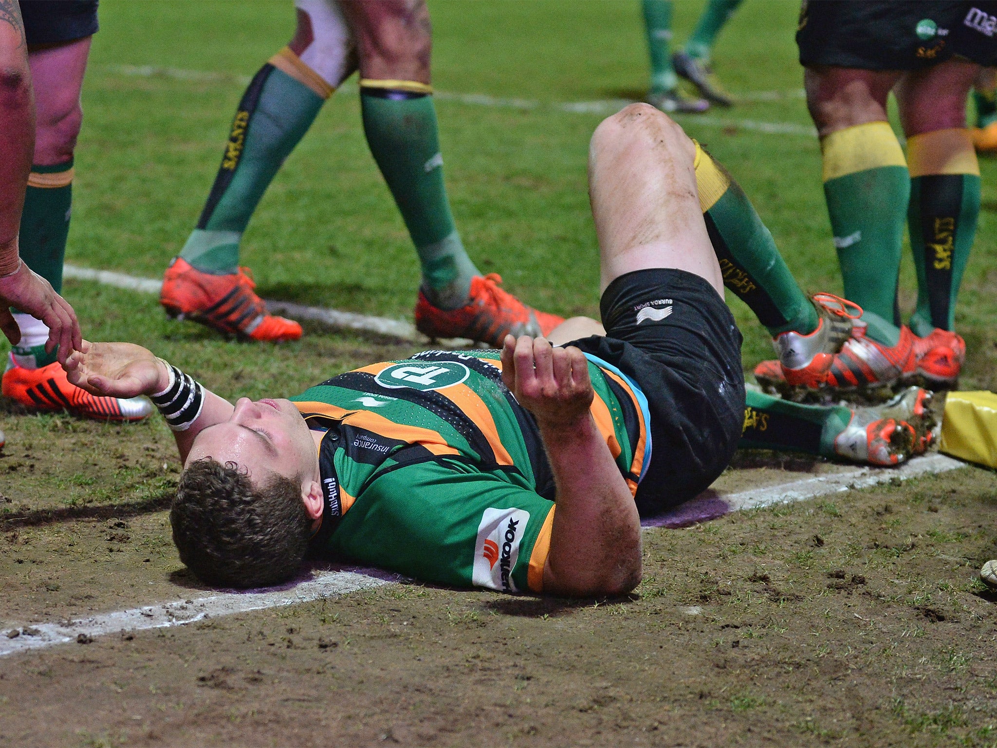 George North is left flat out after being kneed in the head against Wasps on Friday