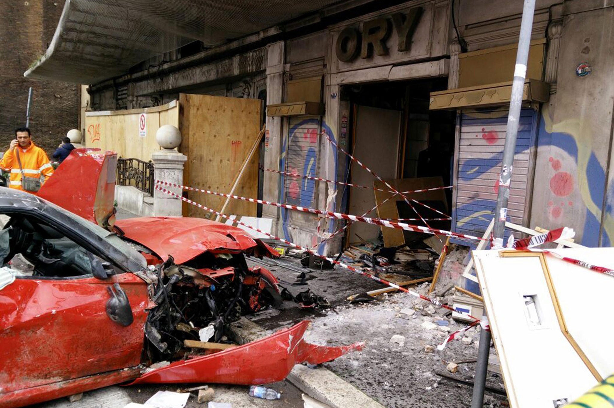 The remains of a Ferrari 599 GTO which crashed into a shop in Viminale's road in Rome, Italy, after the valet mistook the accelerator for the brake