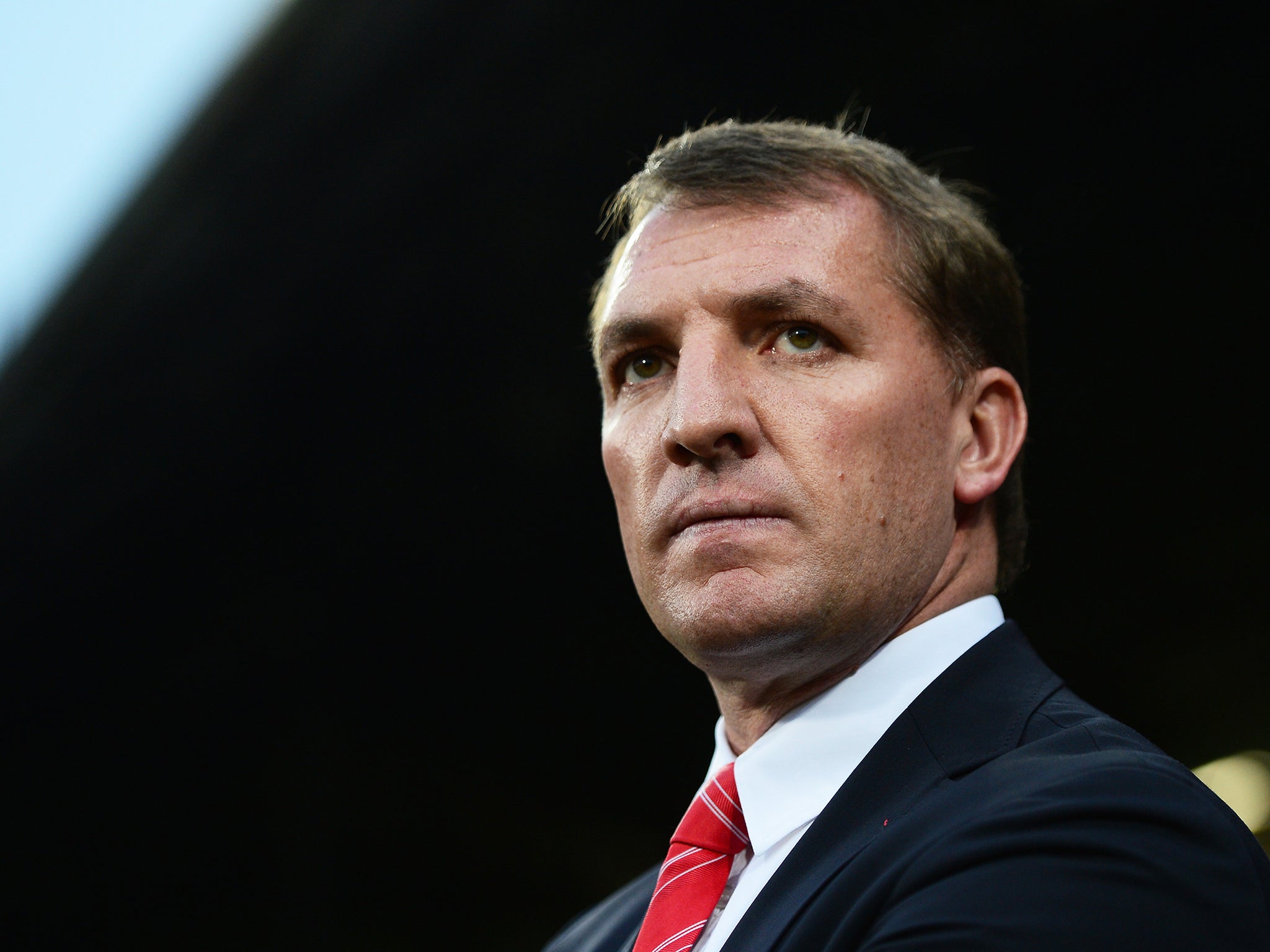 Liverpool manager Brendan Rodgers looks on from the touchline