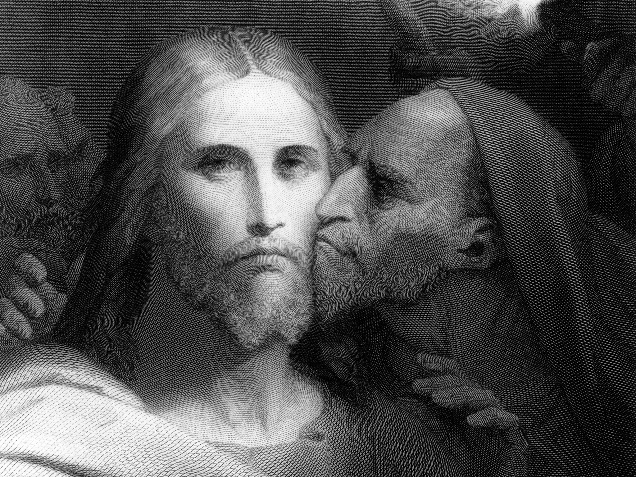 Judas seen kissing Jesus, betraying him to soldiers