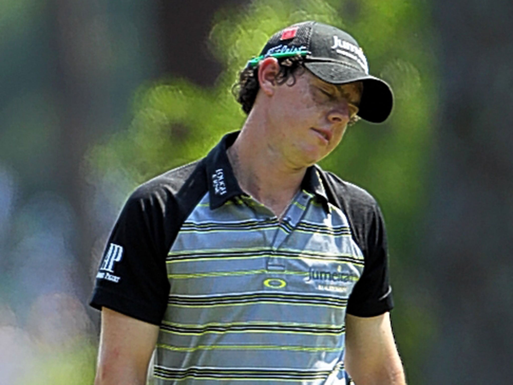 Rory McIlroy reacts to a missed putt during his disastrous final round at the 2011 Masters