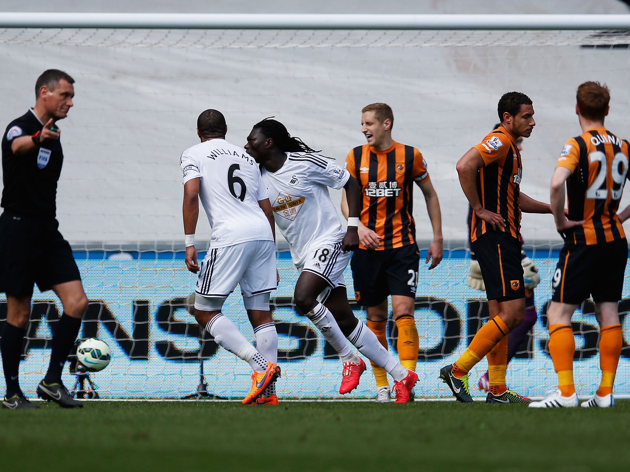 Bafetimbi Gomis peels away after scoring an acrobatic second