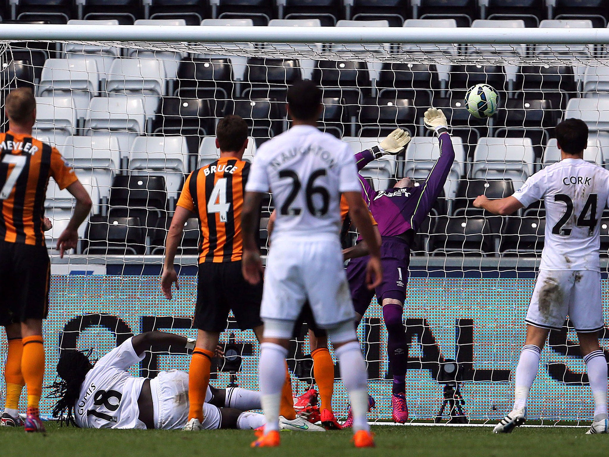 Bafetimbi Gomis' shot goes above the head of Allan McGregor