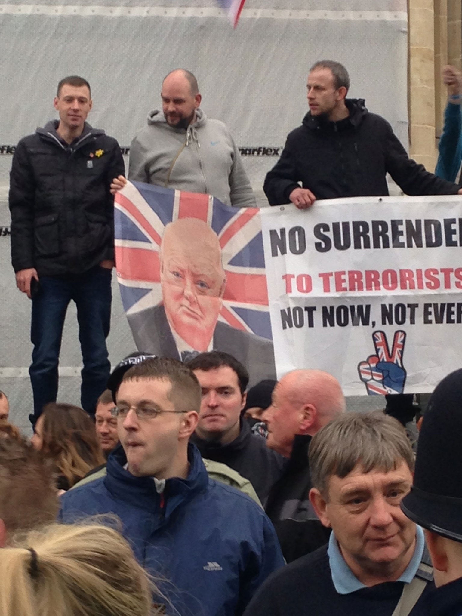 Pegida UK supporters carried a banner picturing Winston Churchill with the slogan 'no surrender to terrorists'