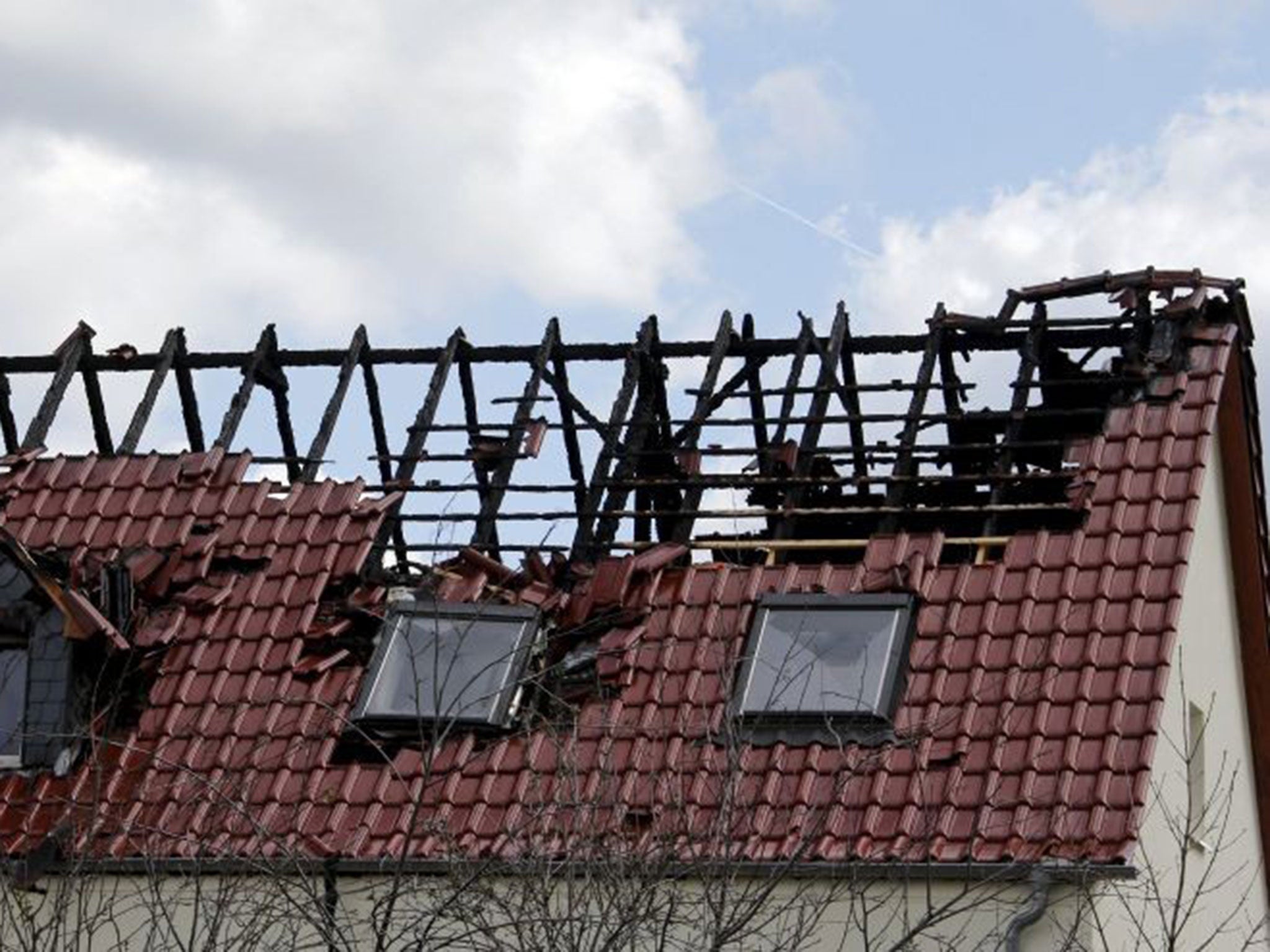 A building set to be used as an asylum seekers' home was damaged by fire