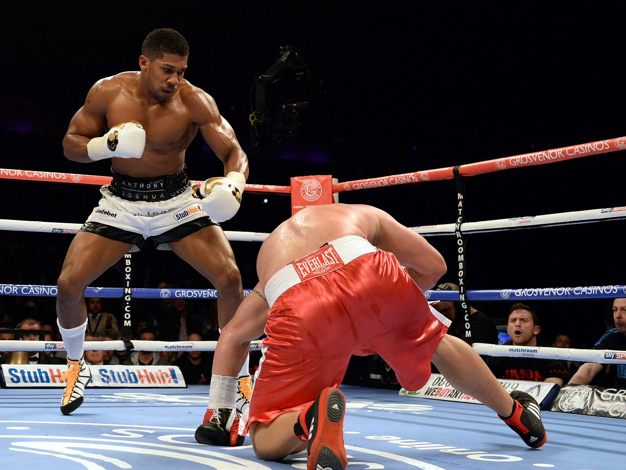 Anthony Joshua (L) in action with Jason Gavern
