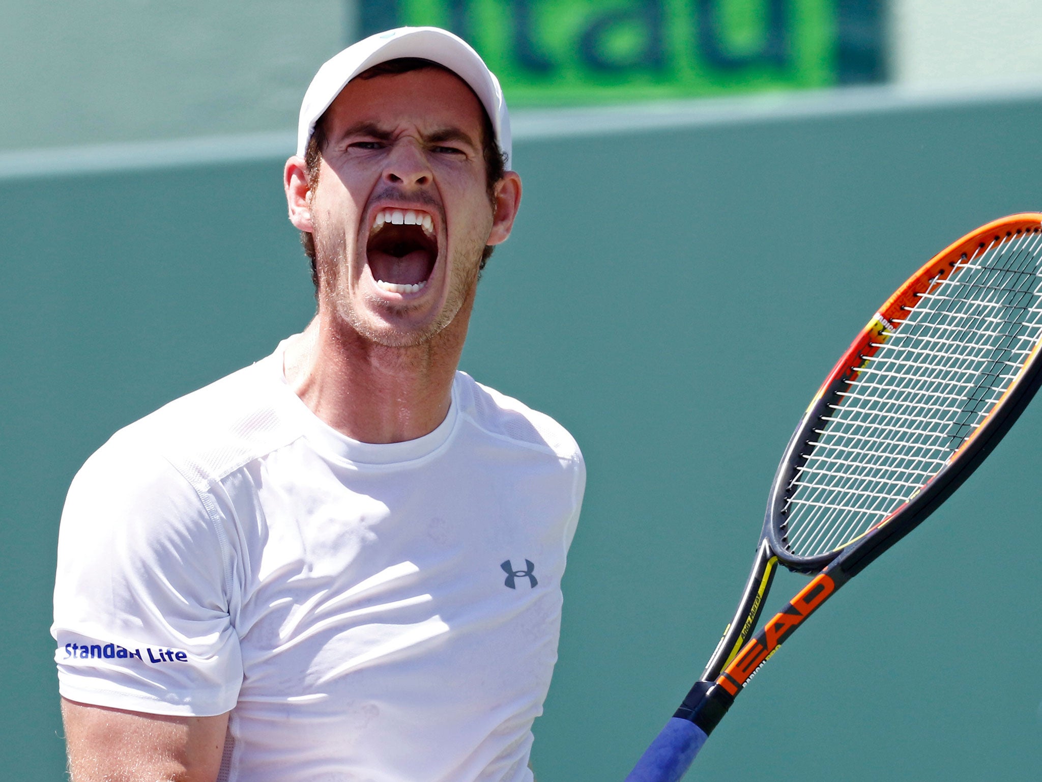 Andy Murray reacts after losing a point to Novak Djokovic during the men's final match at the Miami Open