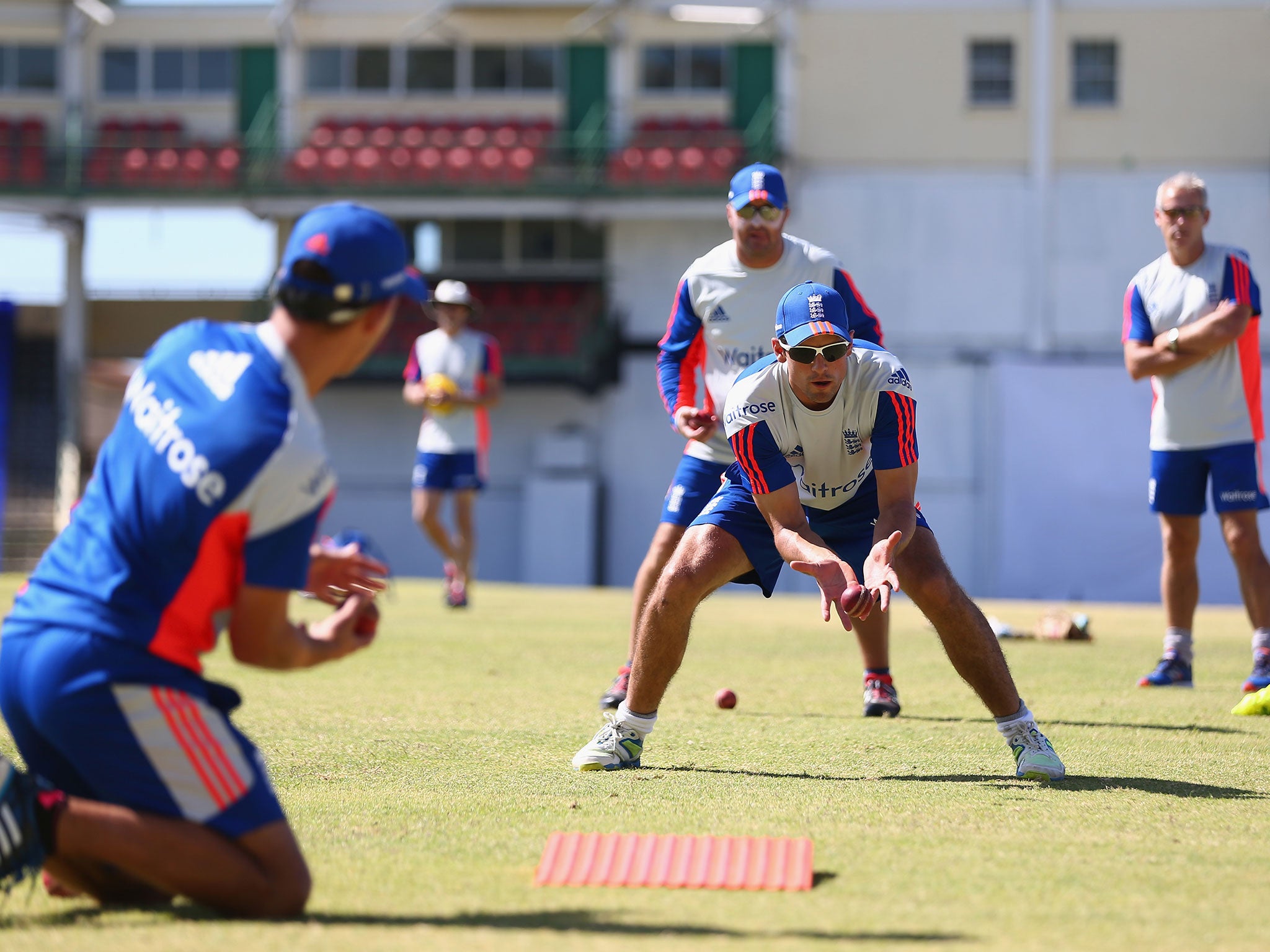 The England captain, Alastair Cook, takes a catch in practice in Basseterre, St Kitts