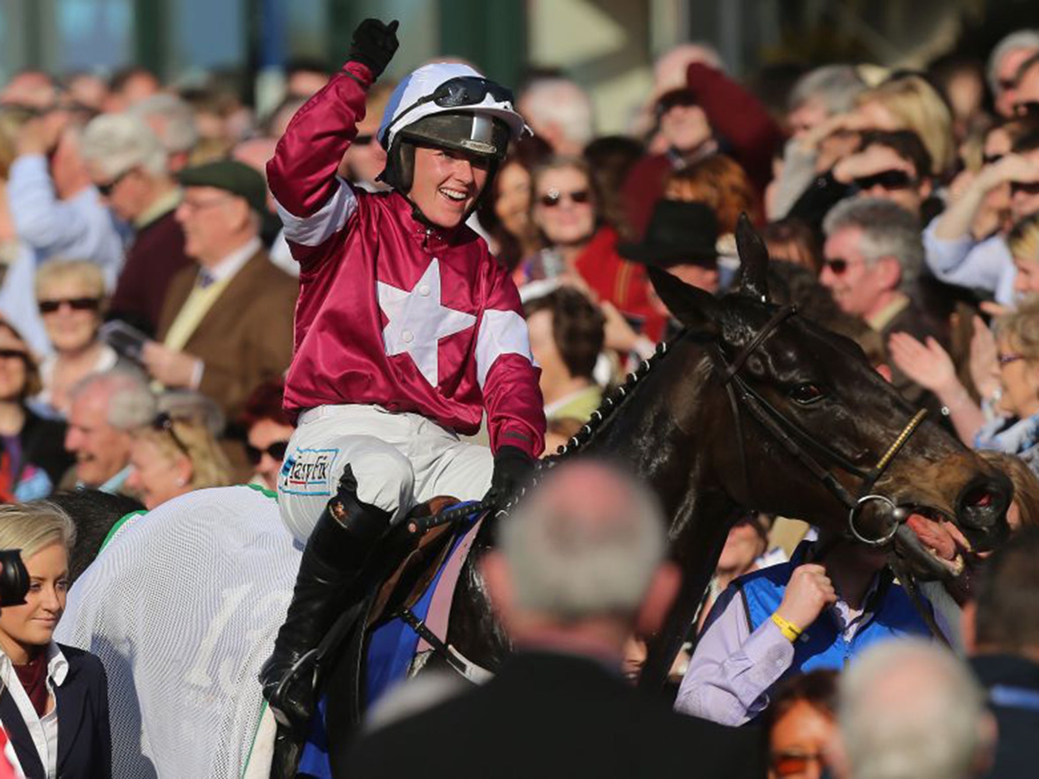 Katie Walsh celebrates aboard Thunder And Roses after winning the Irish Grand National at Fairyhouse on Monday