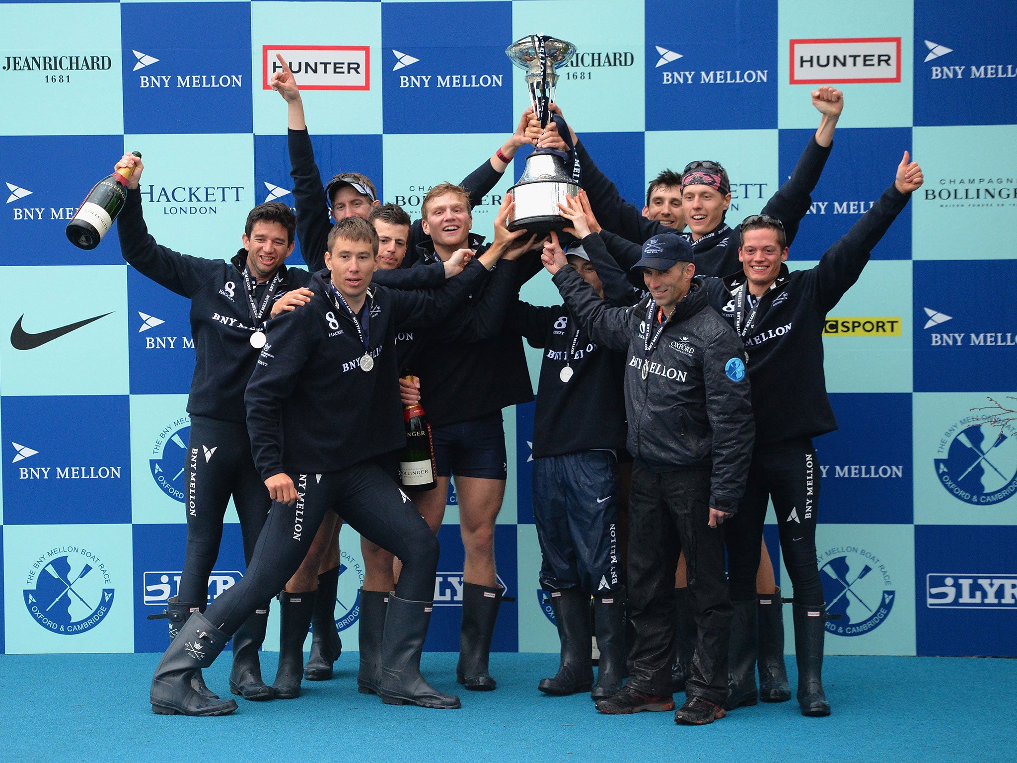The victorious Oxford crew lift the trophy after winning the 2014 Boat Race