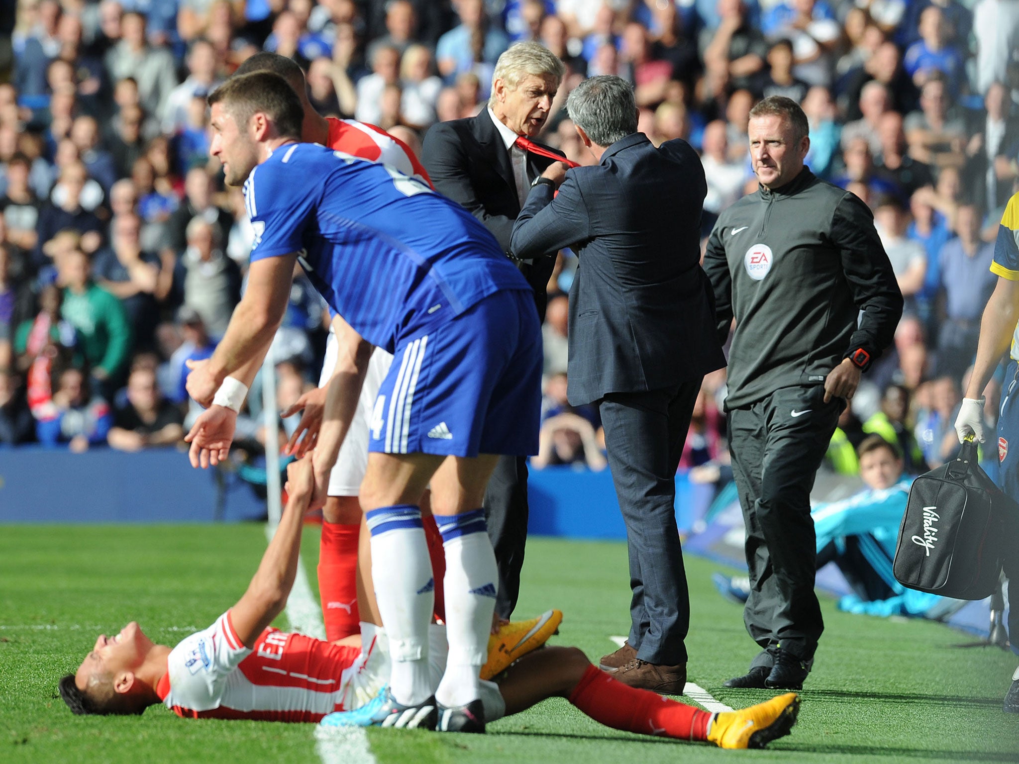 Wenger and Mourinho clash on the sidelines at Stamford Bridge earlier this season