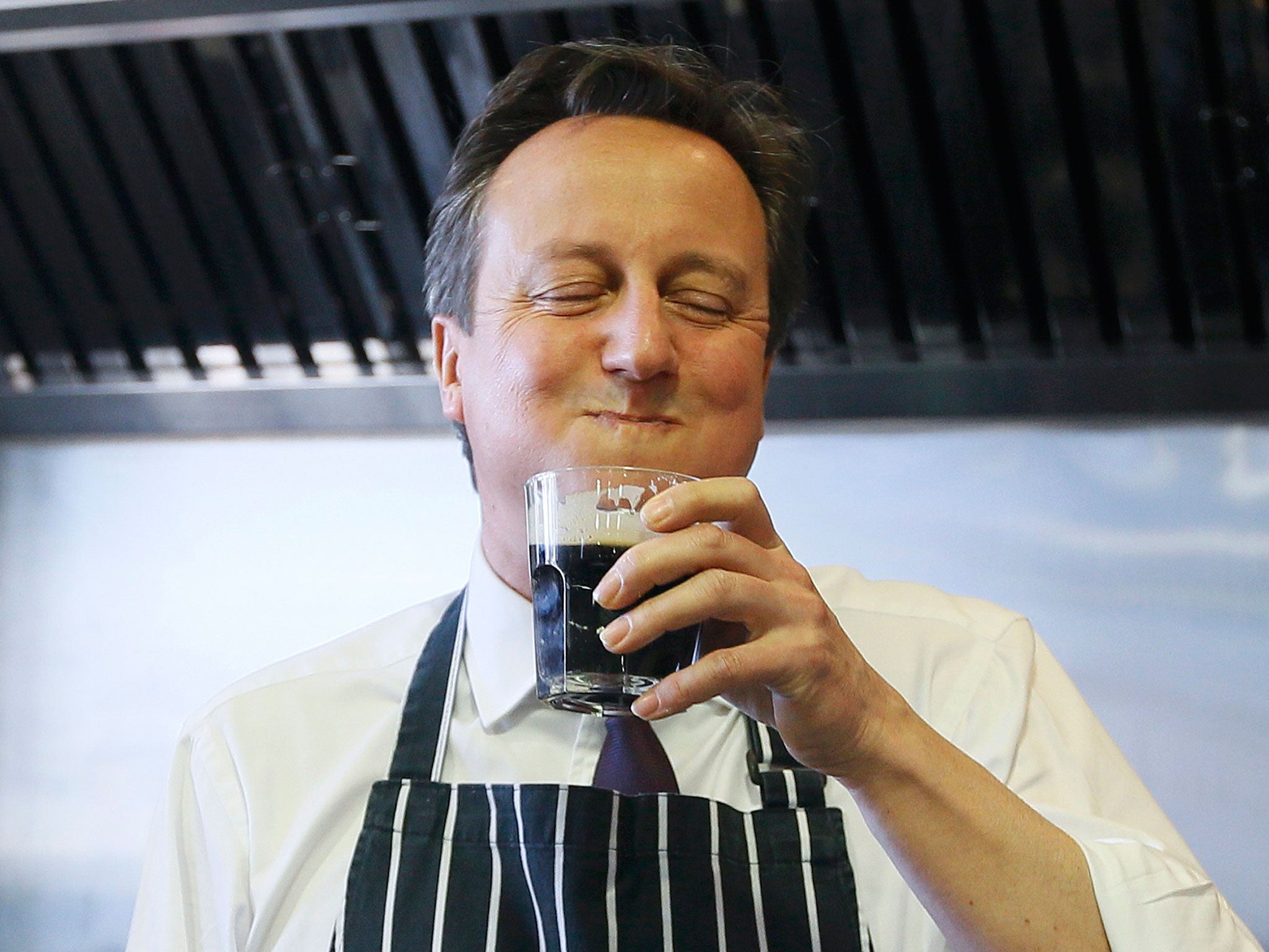 David Cameron tastes some stout during a visit to Brains Brewery in Cardiff