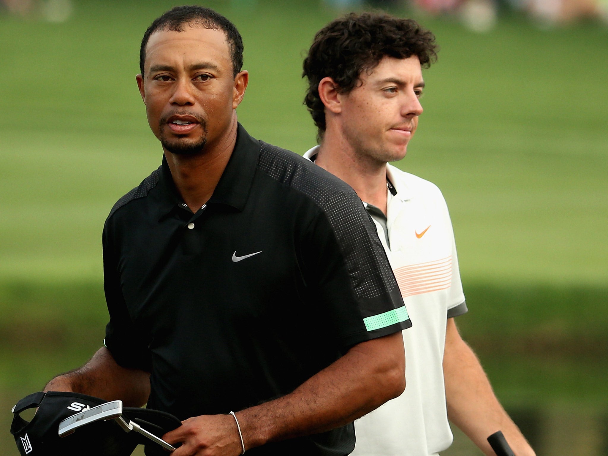 Woods and McIlroy last January, during the Dubai Desert Classic (Getty)