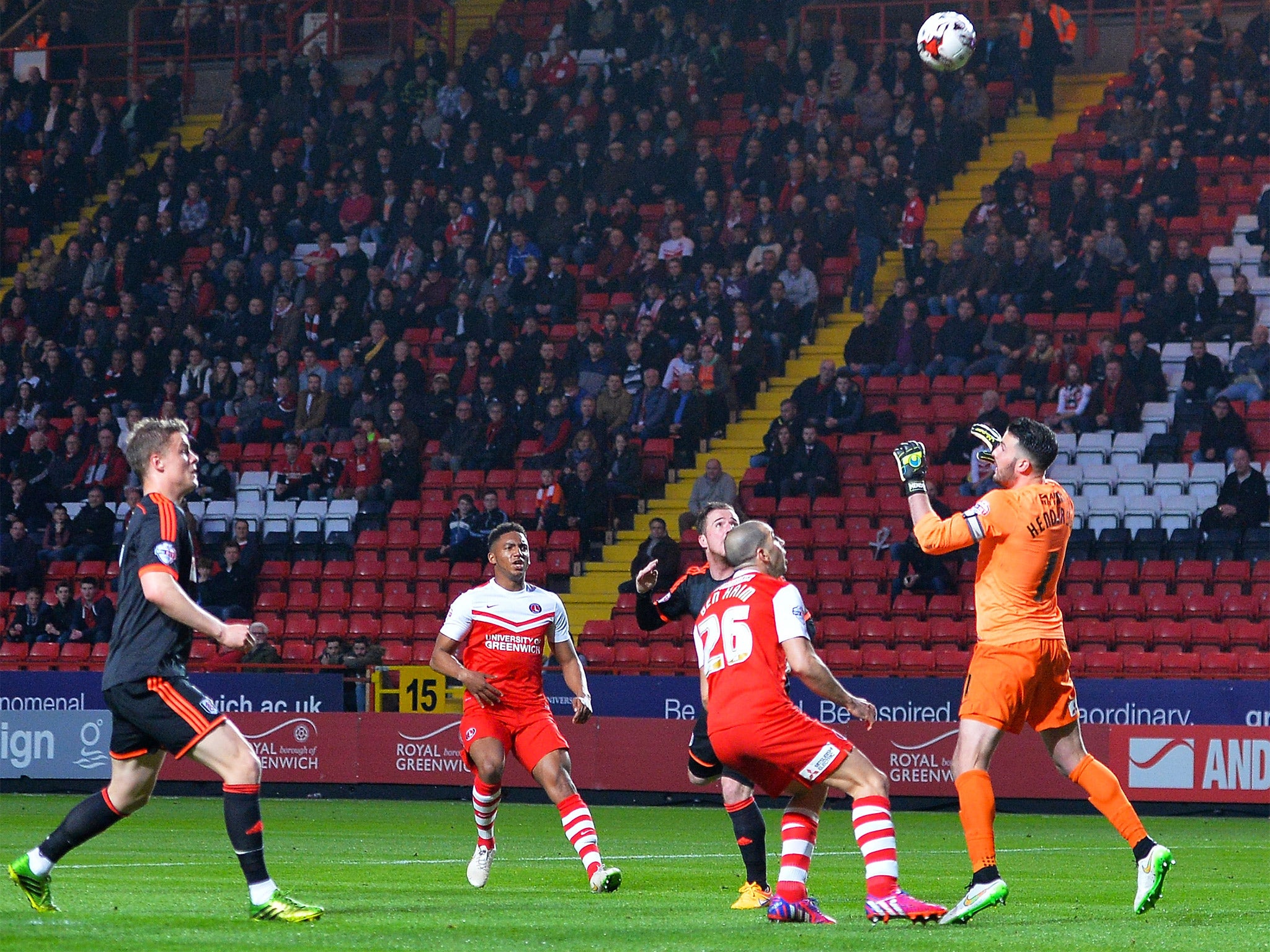 Ross McCormack gives Fulham the lead, looping a header over Charlton keeper Stephen Henderson