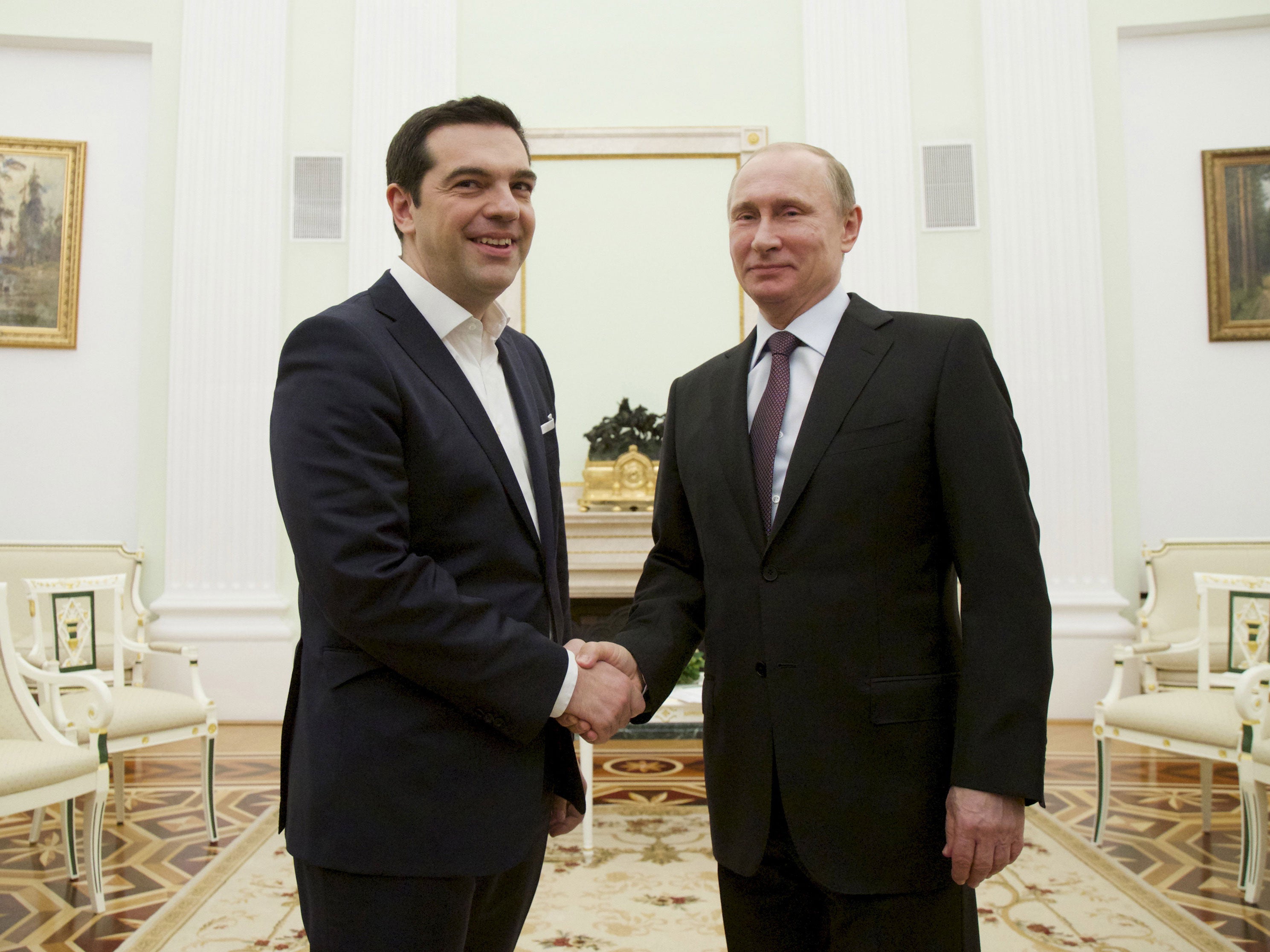 Tsipras began talks with Putin as his indebted country scrambles for funds, but officials said Athens had not asked for money from Moscow