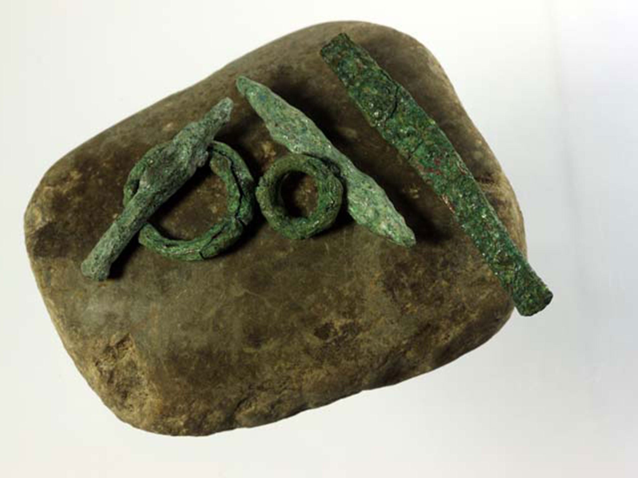 Copper tools, and a stone hammer (University of Manchester)