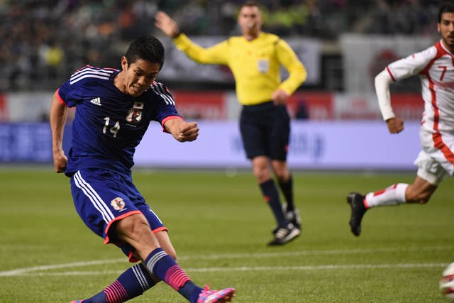 Yoshinori Muto in action for Japan