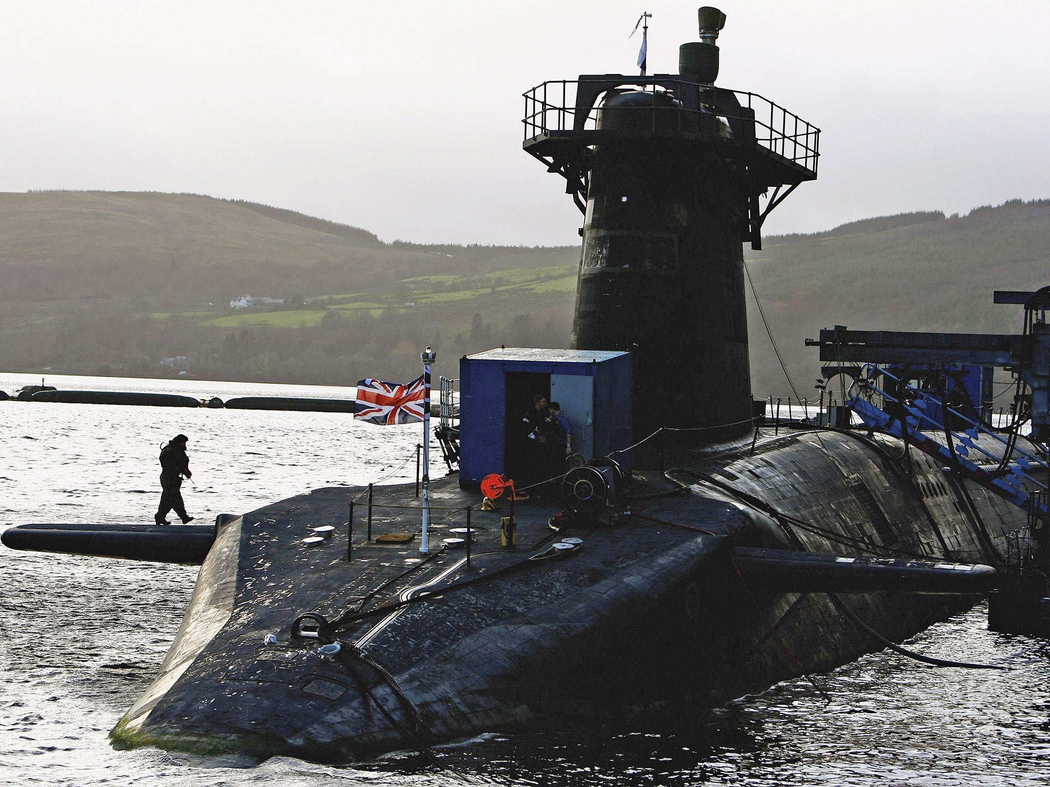 HMS Vanguard, one of Britain's Trident nuclear submarines, sits in dock at Faslane Submarine base on the river Clyde in Helensburgh, Scotland