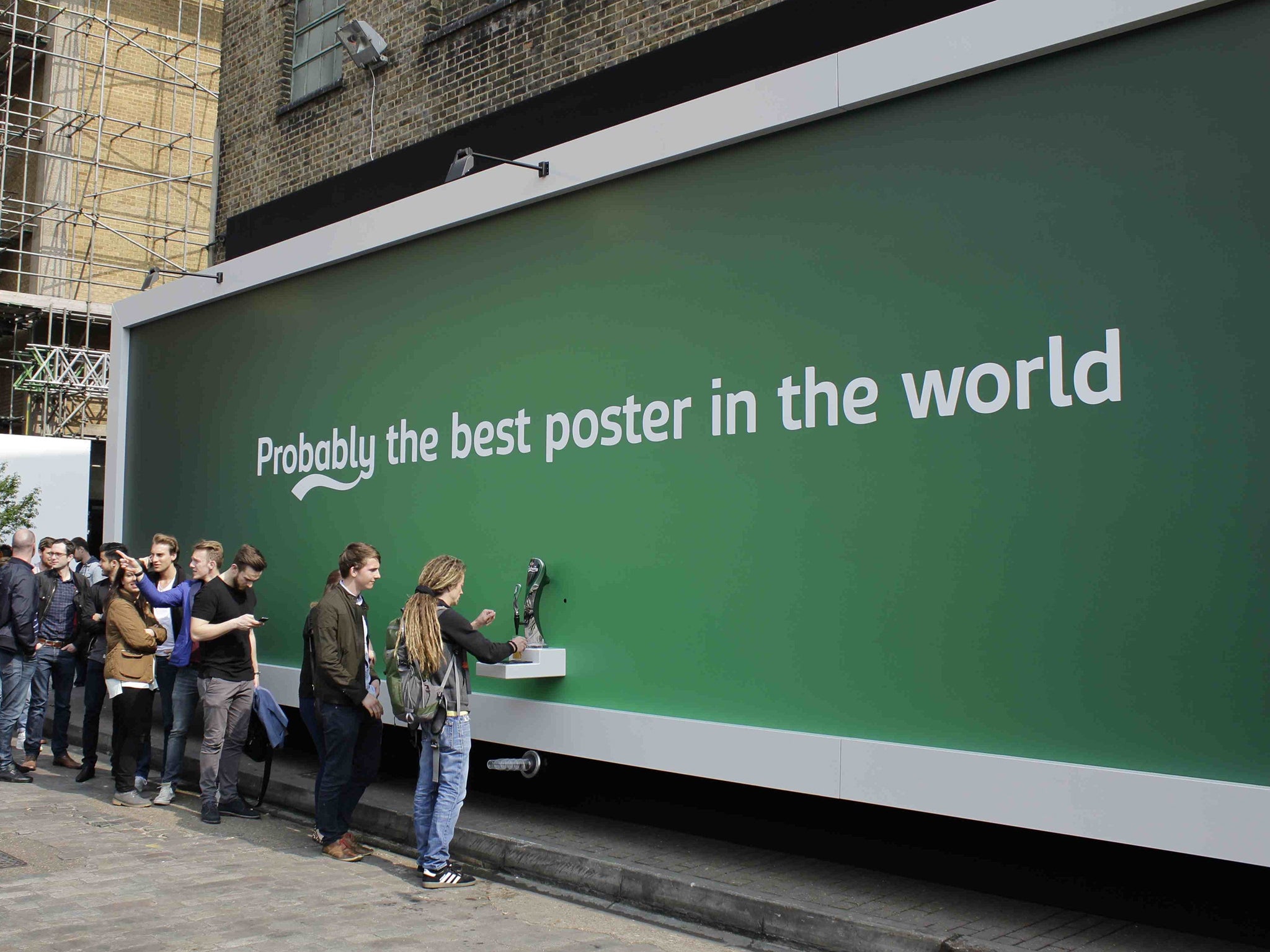 Here for the beer: the Carlsberg advertising stunt in Brick Lane, east London, drawing a crowd