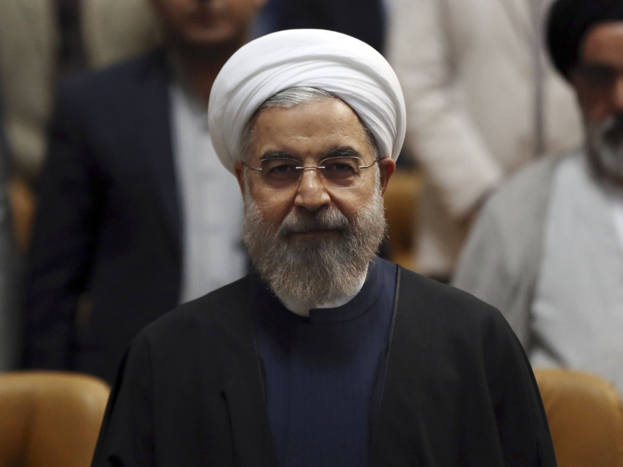 Iranian President Hassan Rouhani yesterday; he called for a ceasefire and a negotiated end to the conflict