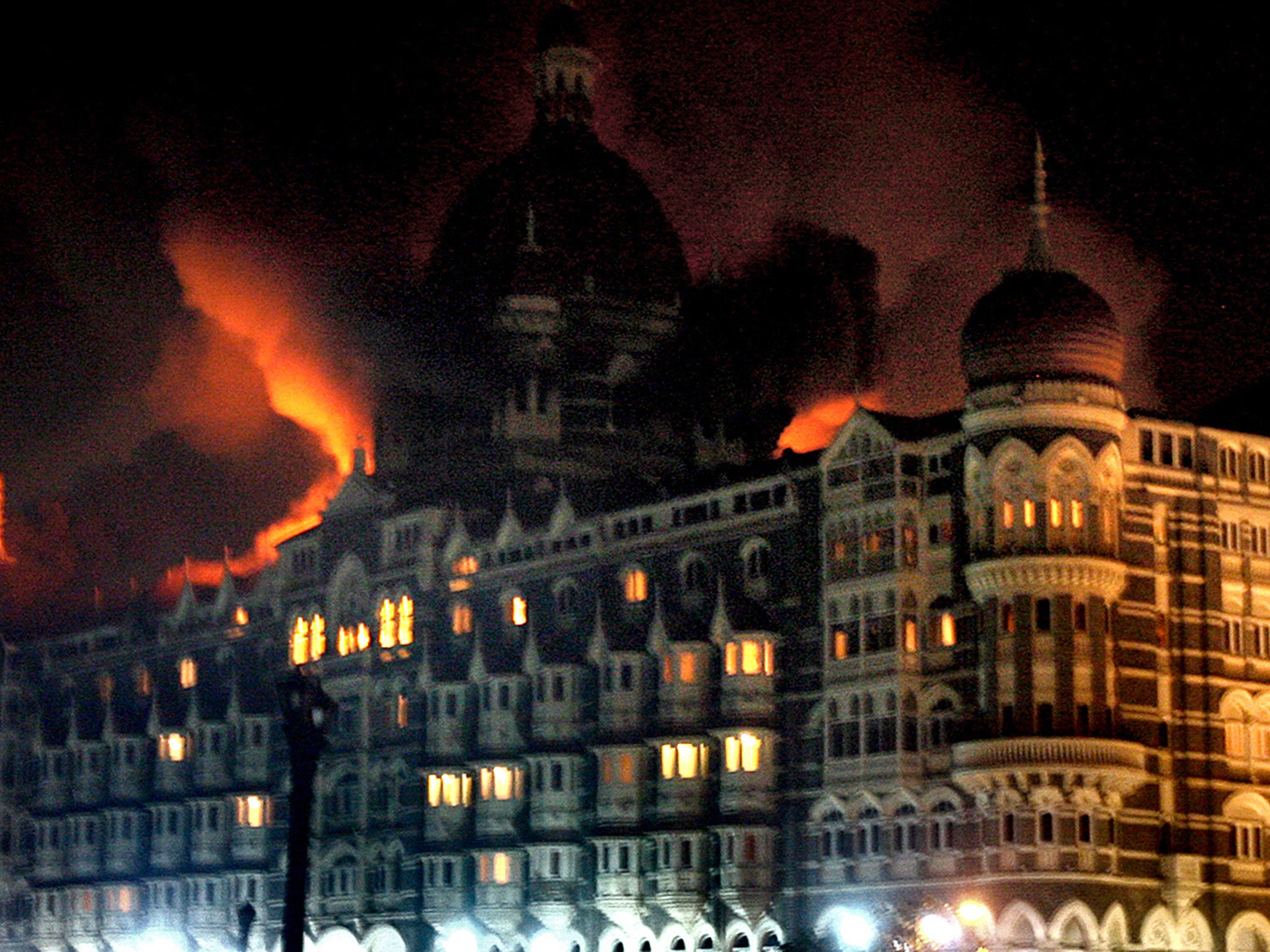 A fire breaks out of the dome of the Taj hotel during a series of attacks in the Indian city of Mumbai in 2008