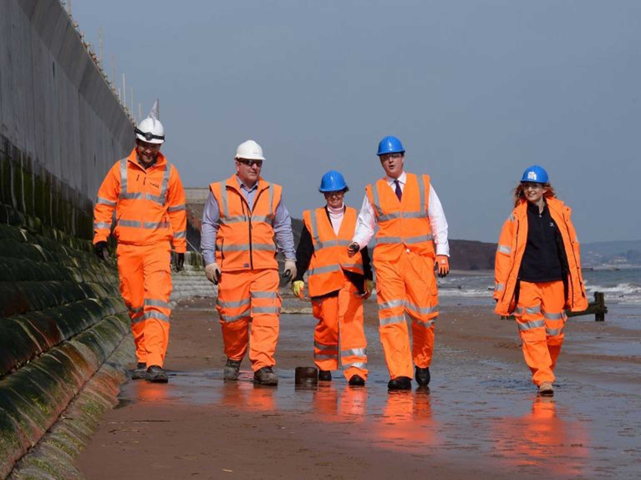 Prime Minister David Cameron meets construction workers at Dawlish in Devon where saw work on the improved sea defences