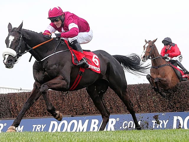 Tony McCoy and Don Cossack on their way to victory in the Melling Chase on Friday