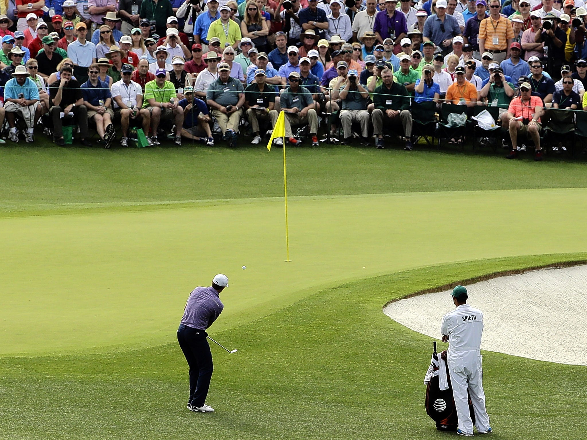 Spieth plays his approach shot to the second at Augusta