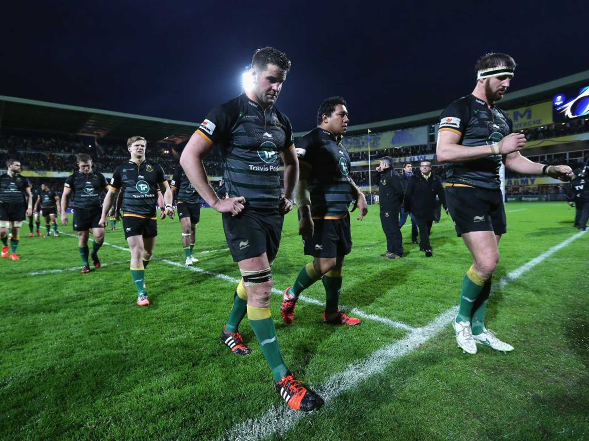 Calum Clark (left) and Tom Wood trudge off after Northampton were beaten 37-5 by Clermont Auvergne in the European Champions Cup last Saturday