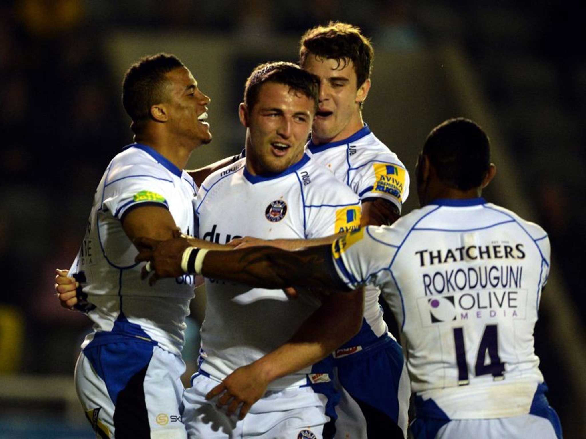Anthony Watson (centre) celebrates with his Bath team-mates after scoring a try in their 29-19 win at Newcastle which takes the visitors up to second in the Premiership table