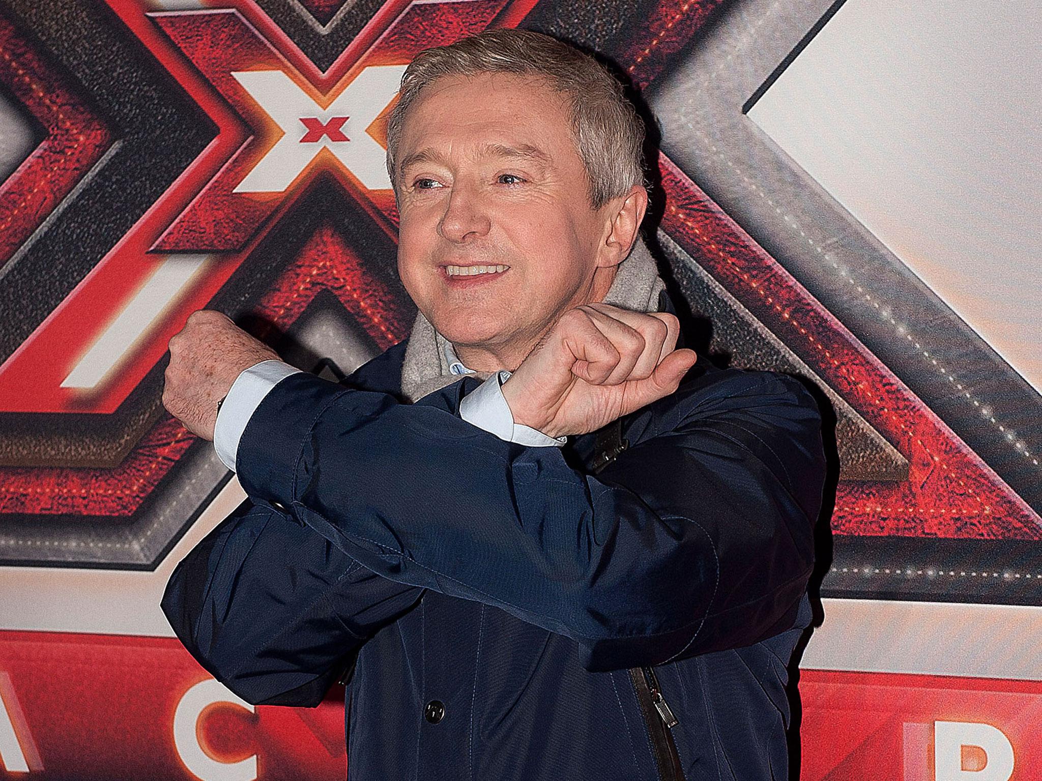 Louis Walsh attends a photocall before 'The X Factor' live final show