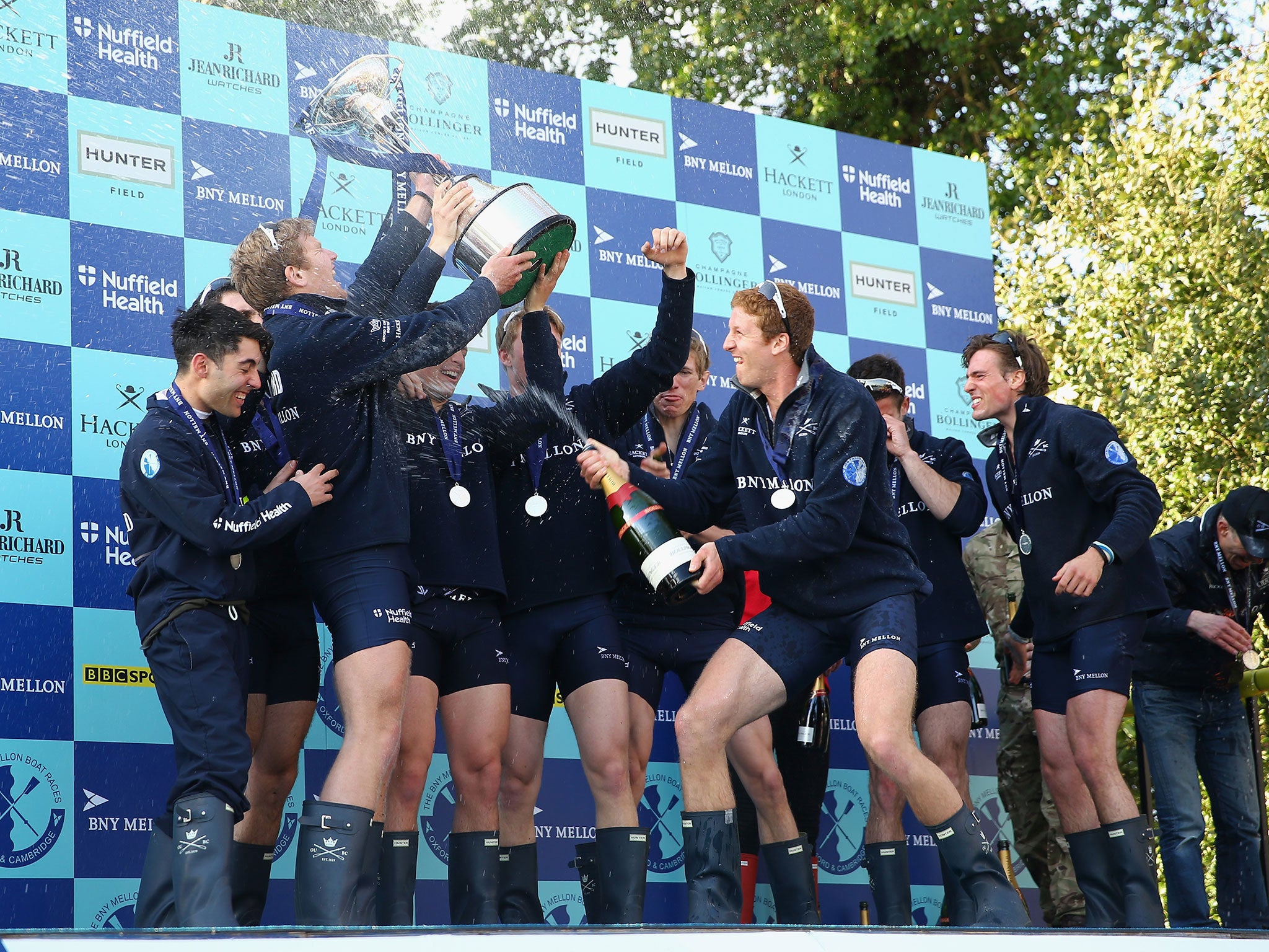 The Men's Oxford Boat Race crew celebrate their victory over Cambridge