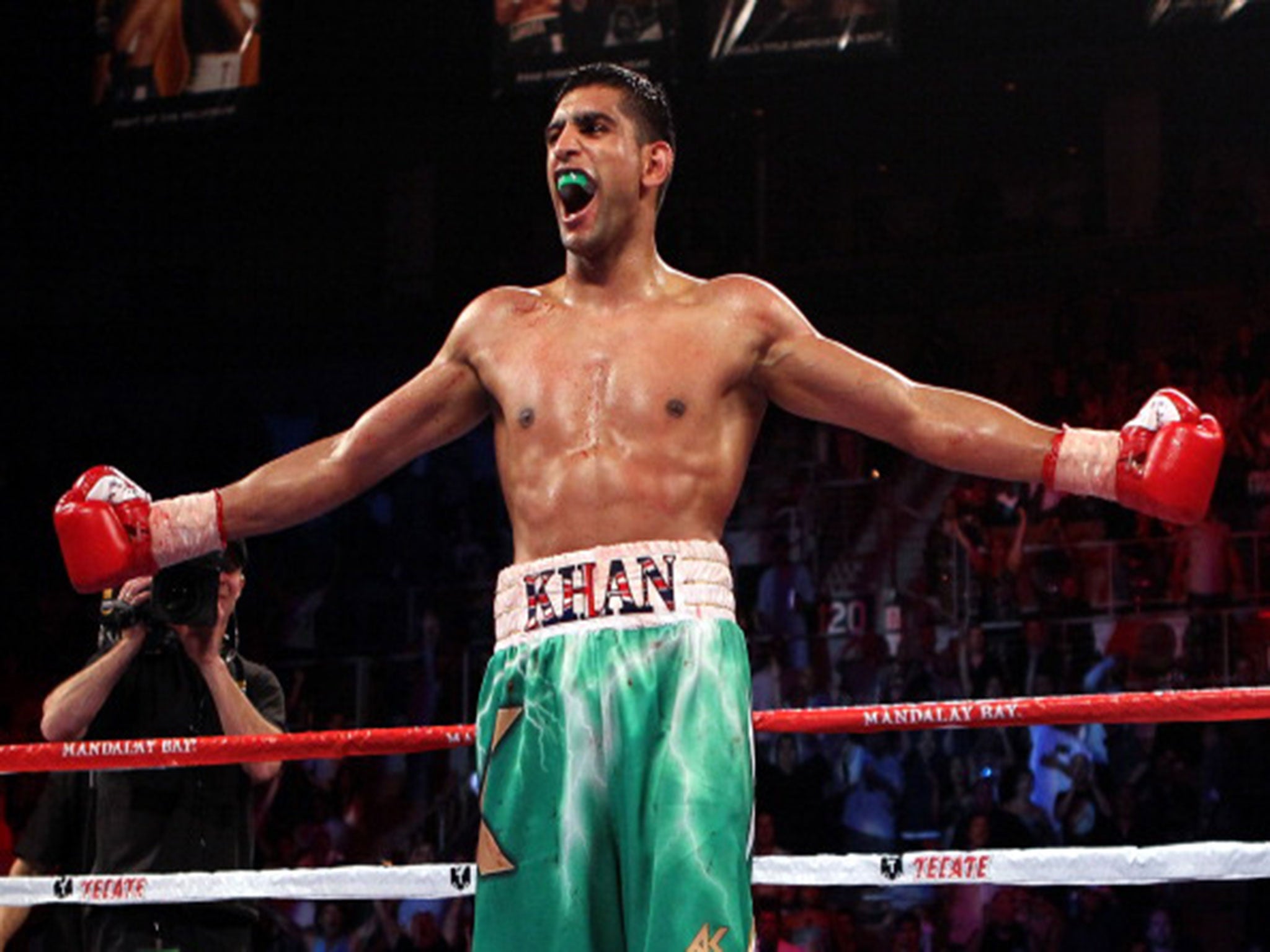 Amir Khan celebrates a knockout