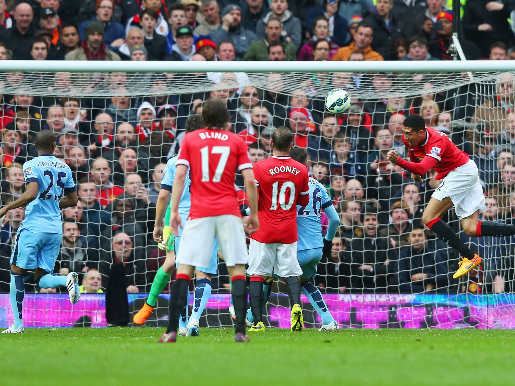 Chris Smalling heads in the fourth for the hosts