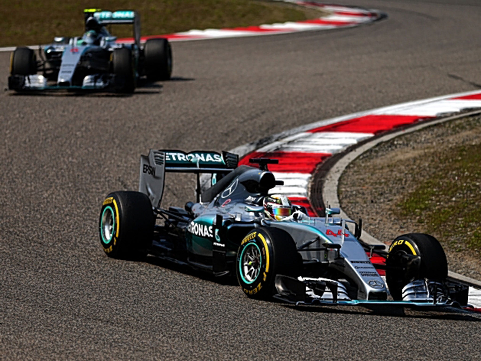 Lewis Hamilton stays just in front of fellow Mercedes driver Nico Rosberg