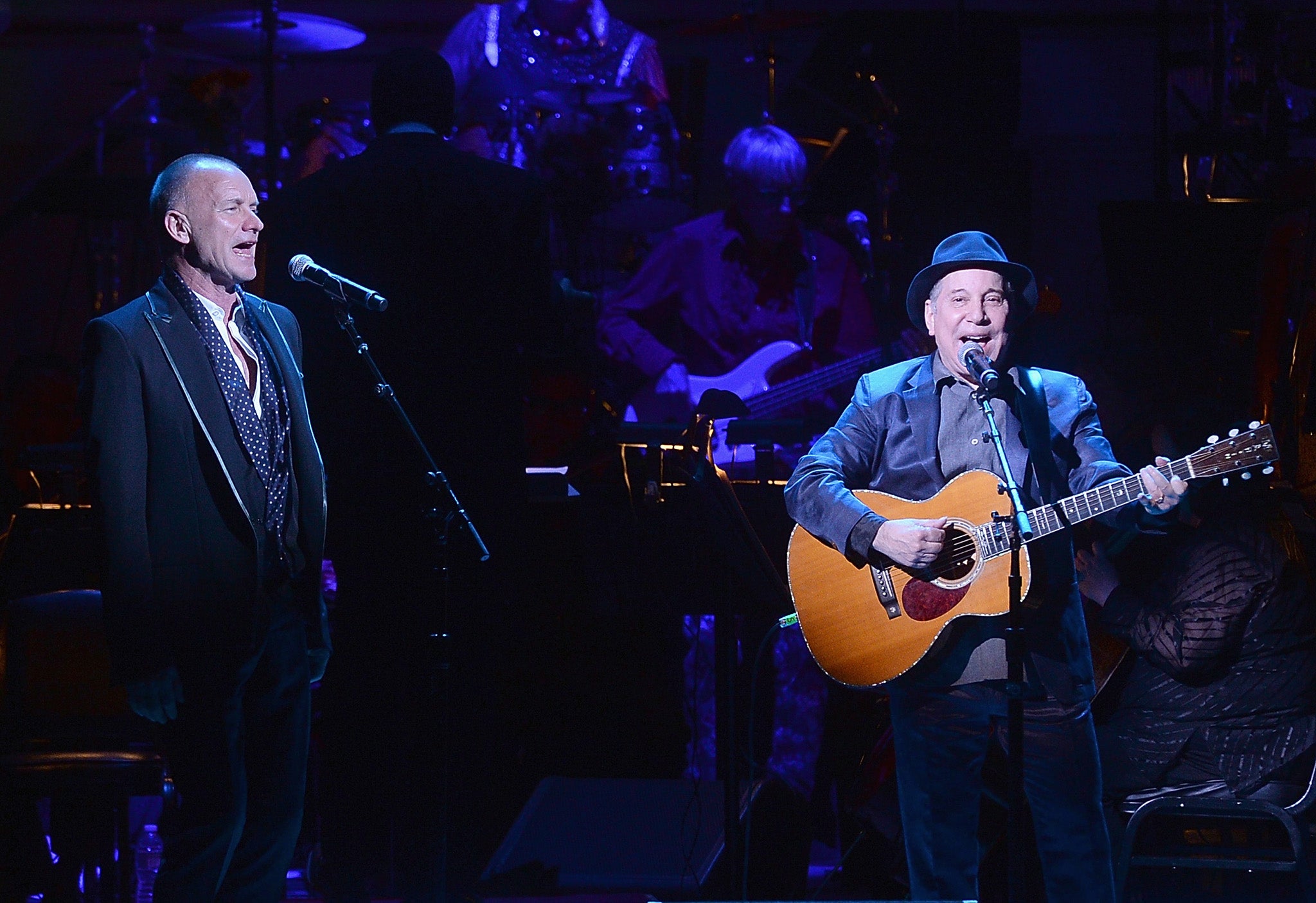 Paul Simon and Sting perform together as part of their world tour