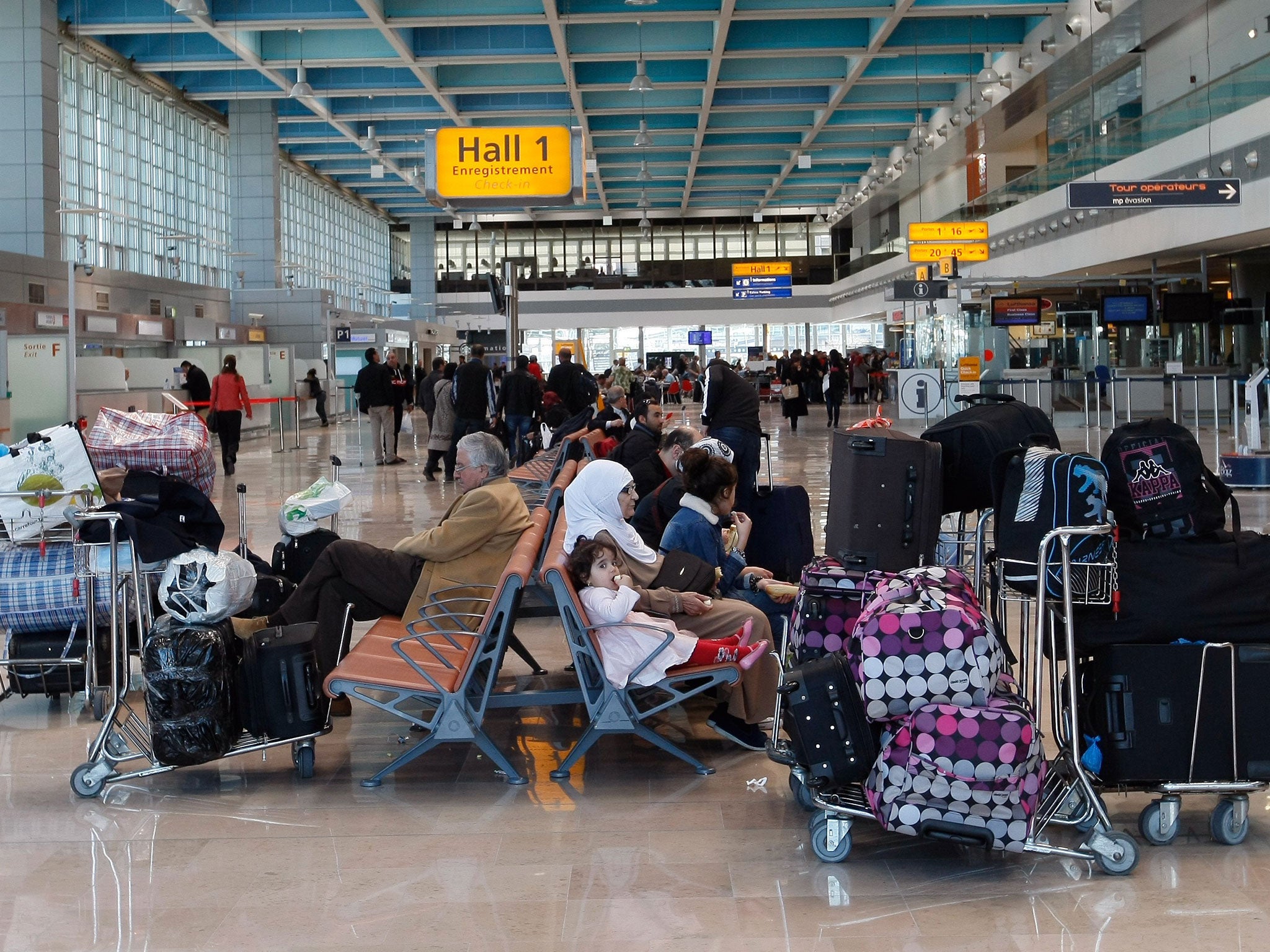 Travellers wait at Marseille Provence airport, in Marignane, southern France, Wednesday, 8 April, 2015