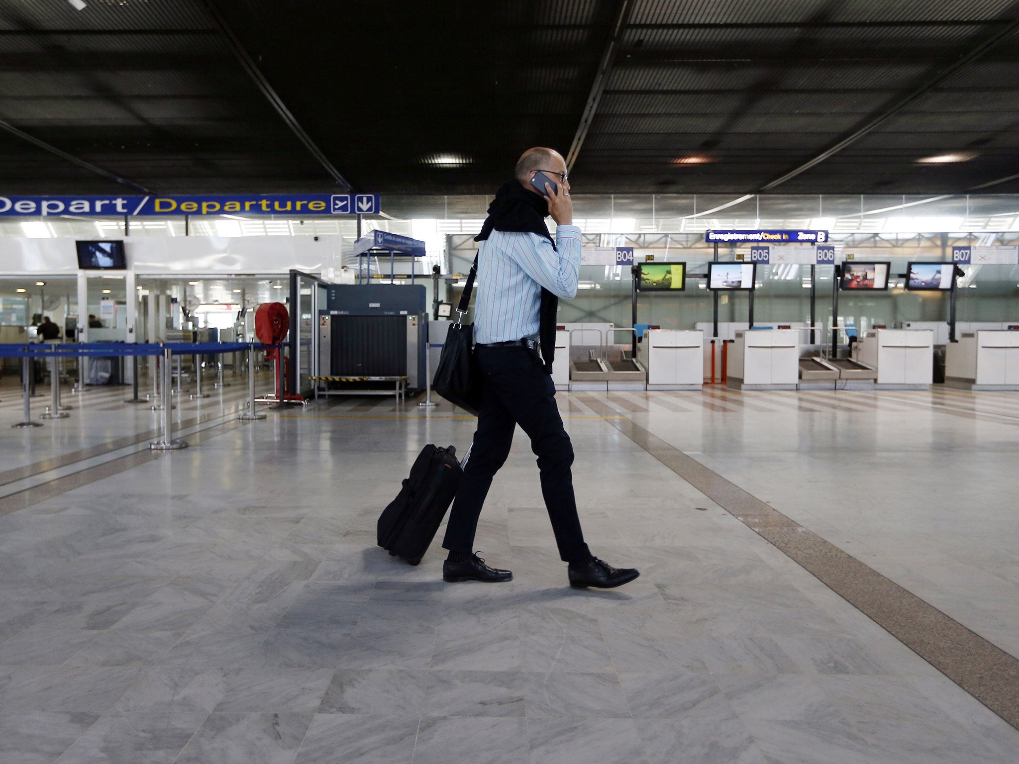 A man walks in Nice's airport, southeastern France, on 9 April, 2015 during an air traffic controllers two-day strike over working conditions