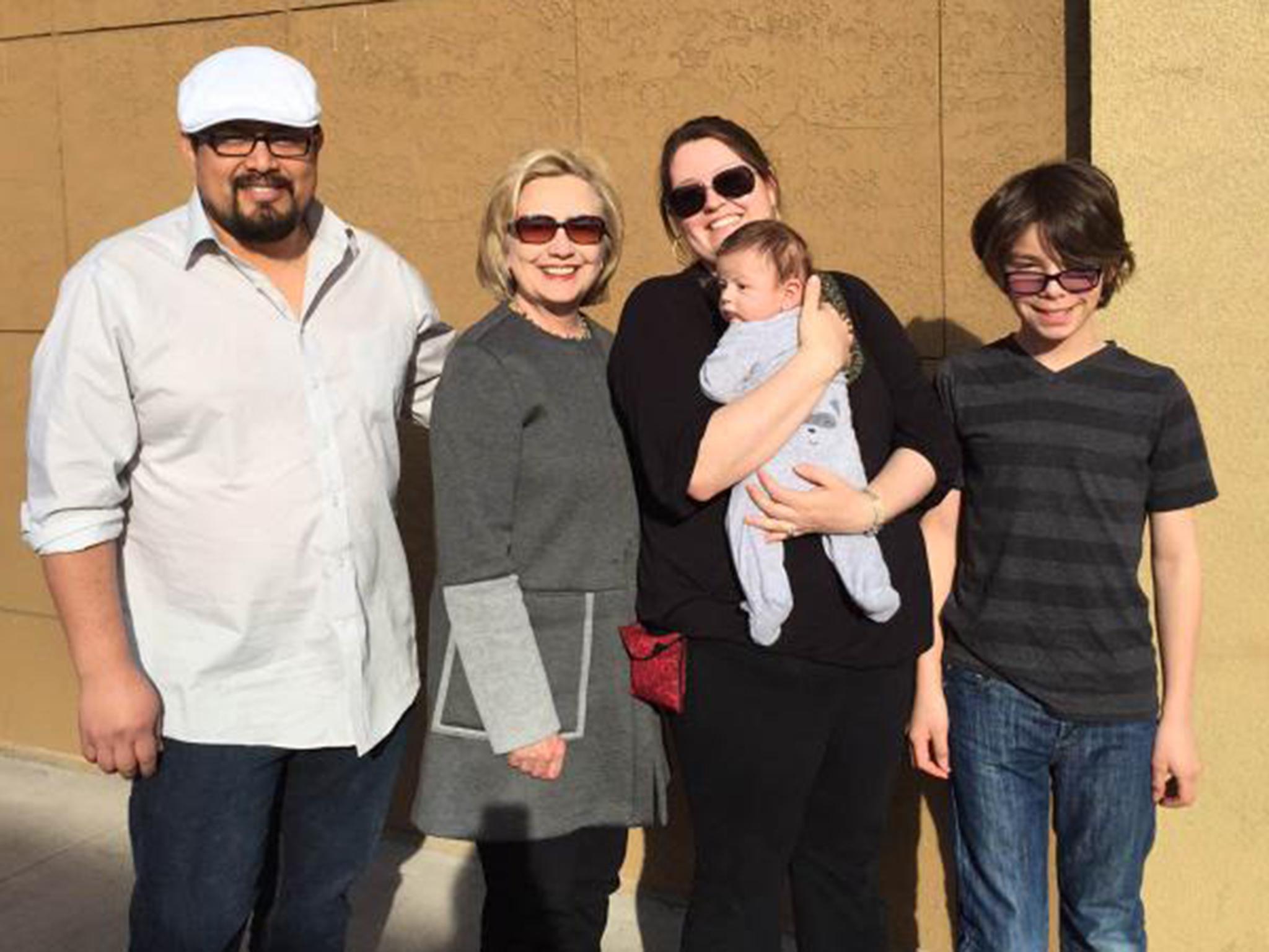 A picture of one family Hillary Clinton, second from left, met on her road trip, which she tweeted