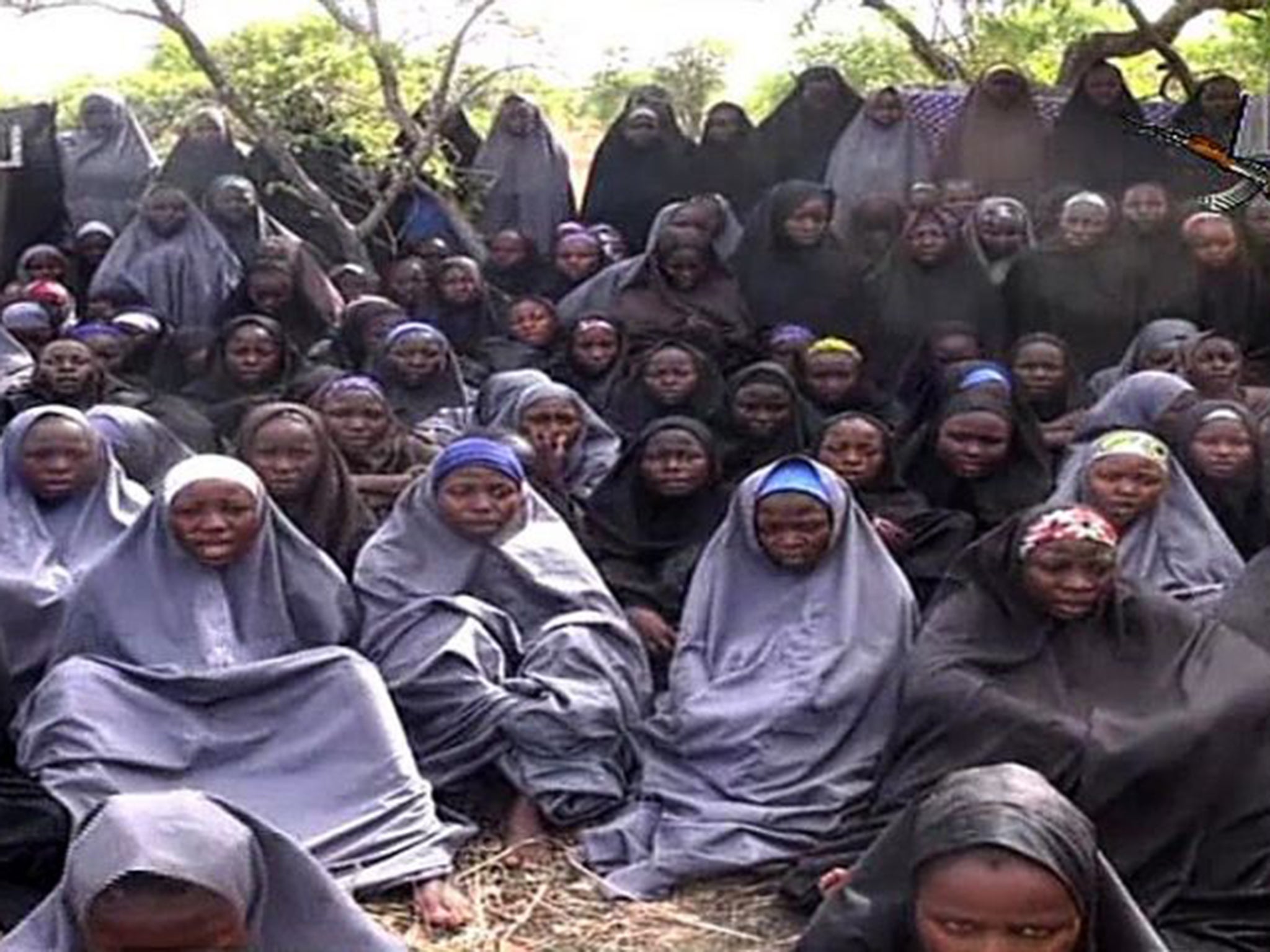 Boko Haram released a video of the kidnapped schoolgirls last year, where they appeared reasonably fit and well in a wooded location, followed by a rant from the group’s leader Abubakar Shekau (AFP)