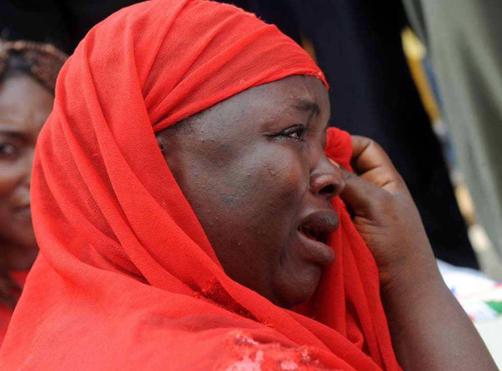 The mother of one of the abducted Chibok schoolgirls at a rally pressing for their rescue in Abuja last year 
