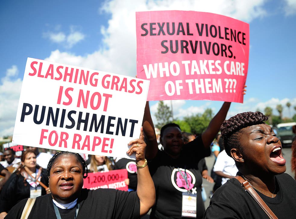 Kenyan protestors march towards the police headquarters on October 31, 2013 in Nairobi to deliver a petition of over a million names demanding justice after men accused of brutally gang raping a schoolgirl cut grass as punishment. The ferocious attack on 