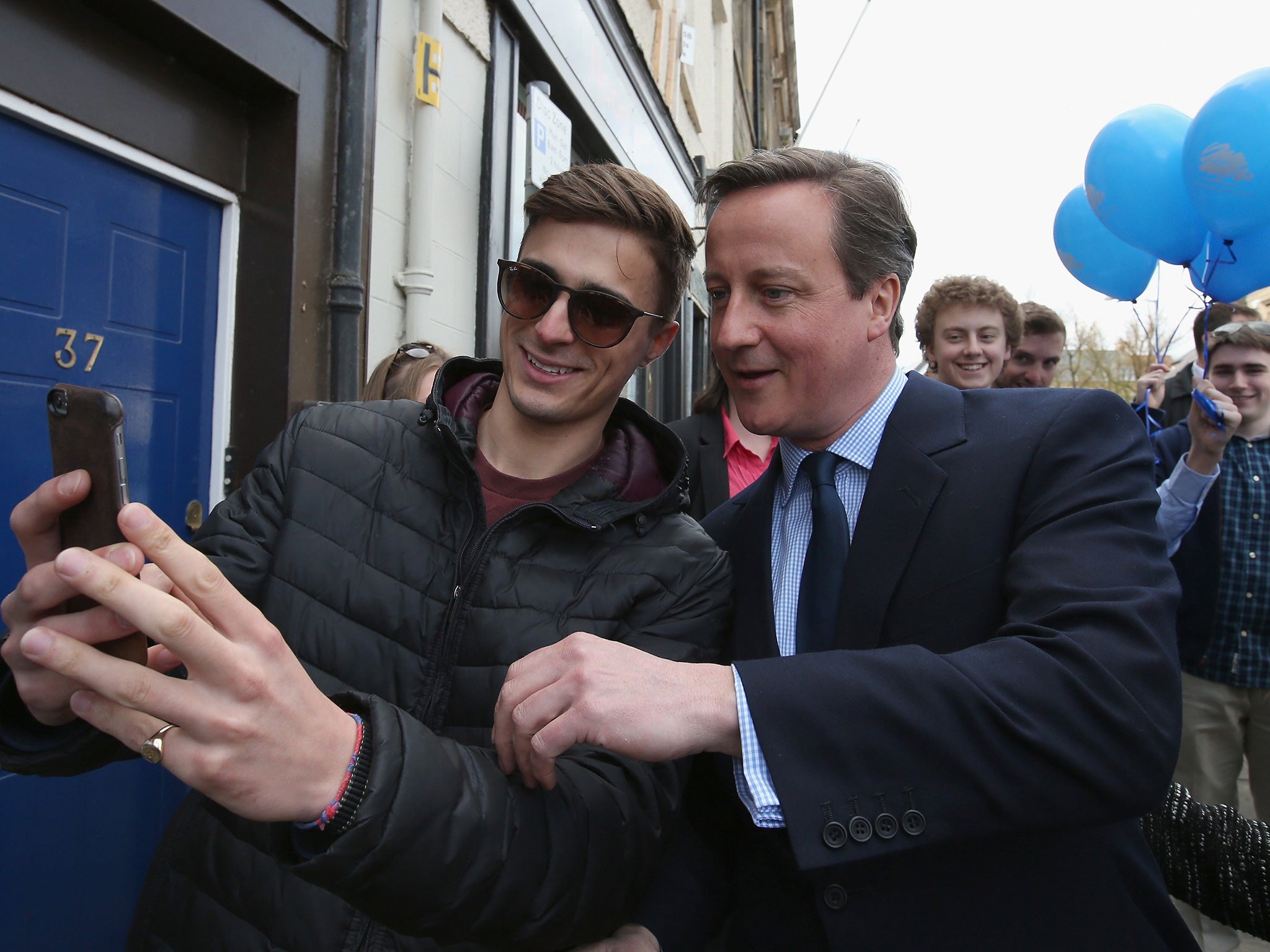 David Cameron poses for a selfie as he tours Alnwick, north-east England