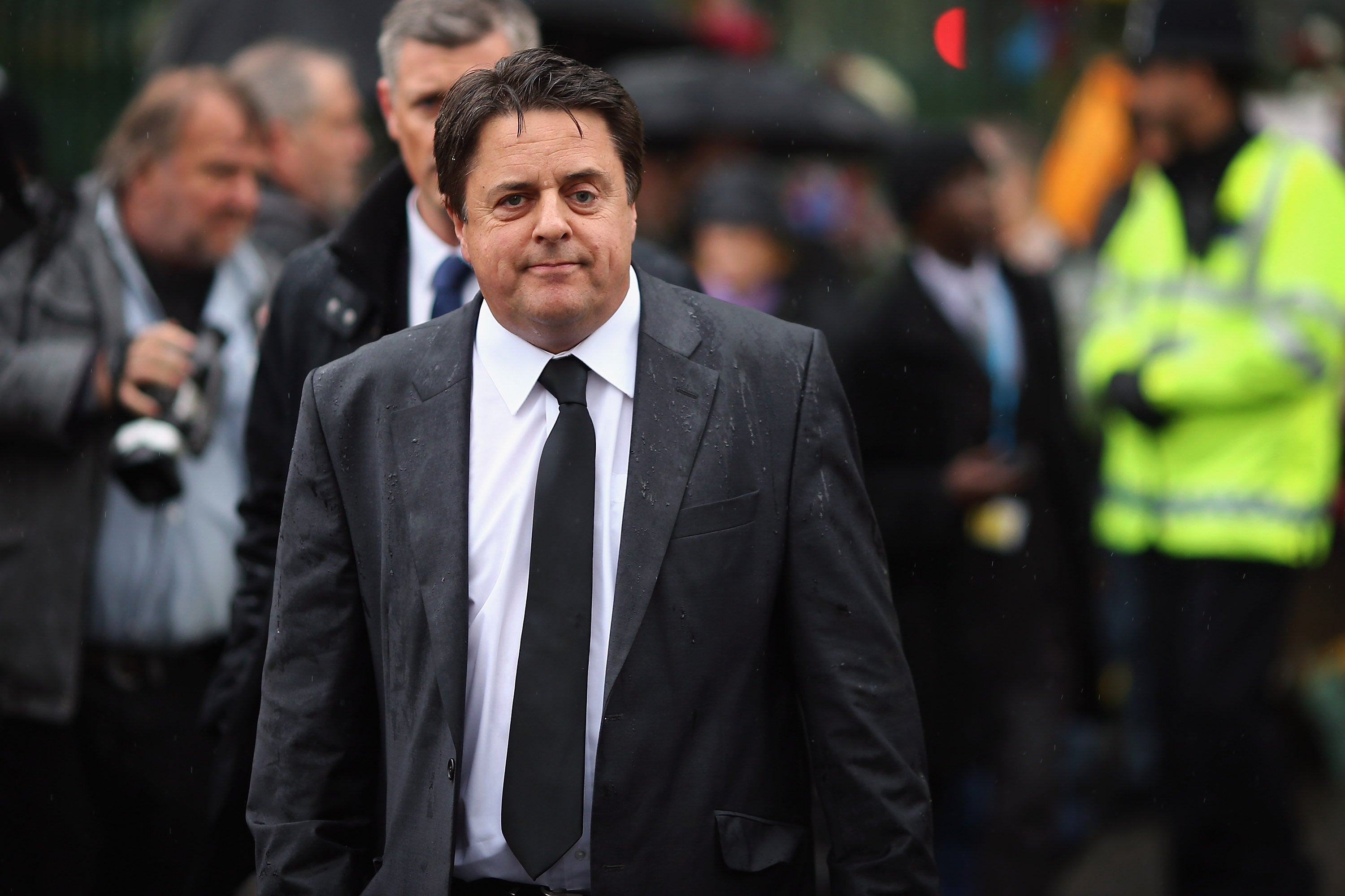 British National Party (BNP) leader Nick Griffin arrives to lay flowers close to the scene where Drummer Lee Rigby of the 2nd Battalion the Royal Regiment of Fusiliers was killed, on May 24, 2013 in London, England. (Photo by Dan Kitwood/Getty Images)