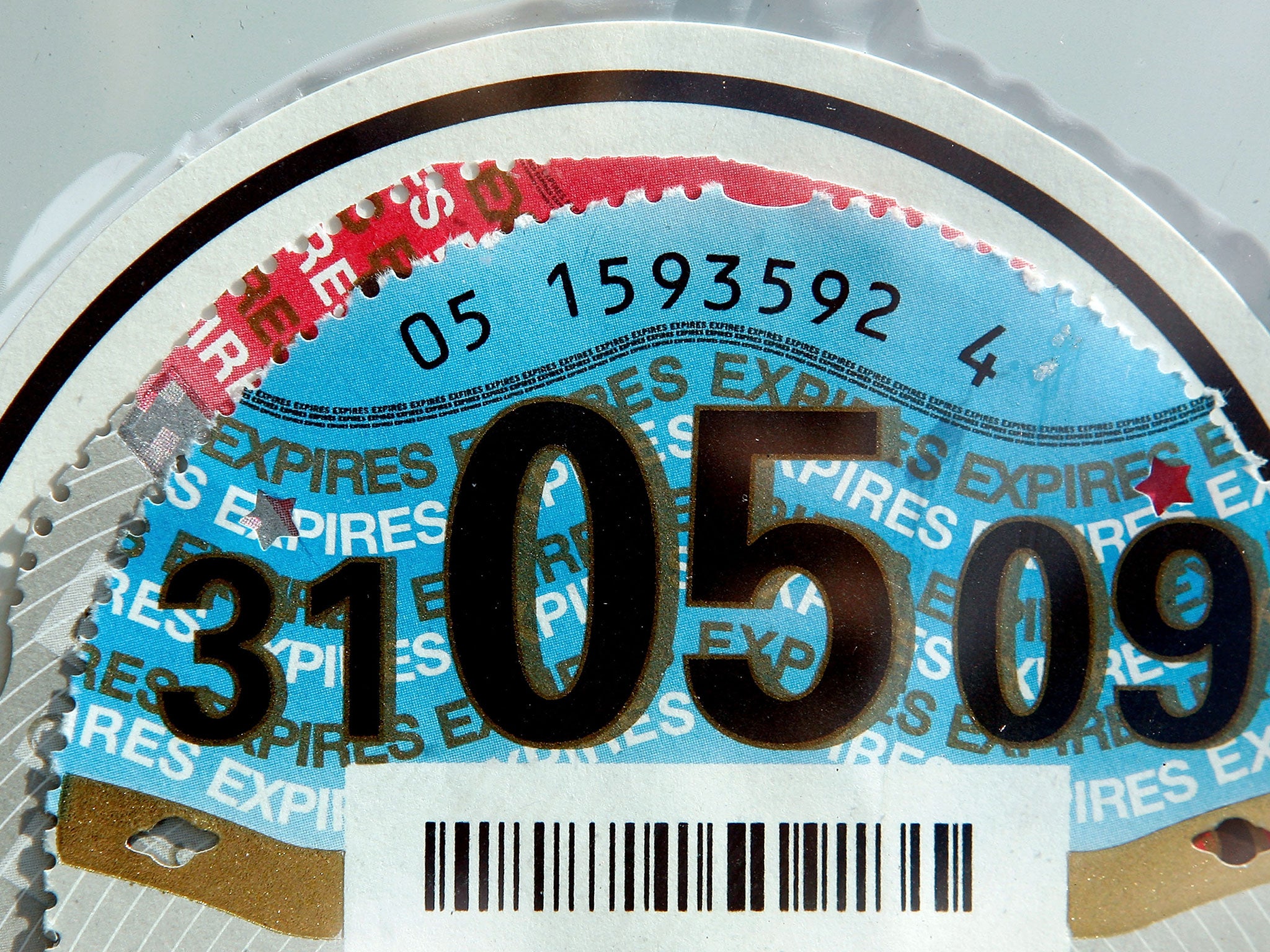 A 2008/ 2009 car tax disc is on display in a car windscreen on August 4, 2008 in London, England. Some MPs believe plans for new increased car tax rates on high fuel consumption vehicles should be made bolder to ensure a more effective impact on the envir