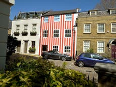 Red and white striped house in Kensington to be re-painted on council