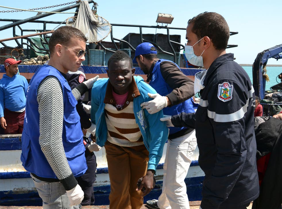 Migrants arrive at the port in the Tunisian town of Zarzis, some 50 kilometres west of the Libyan border, following their rescue by Tunisia's coastguard and navy after their vessel overturned off Libya