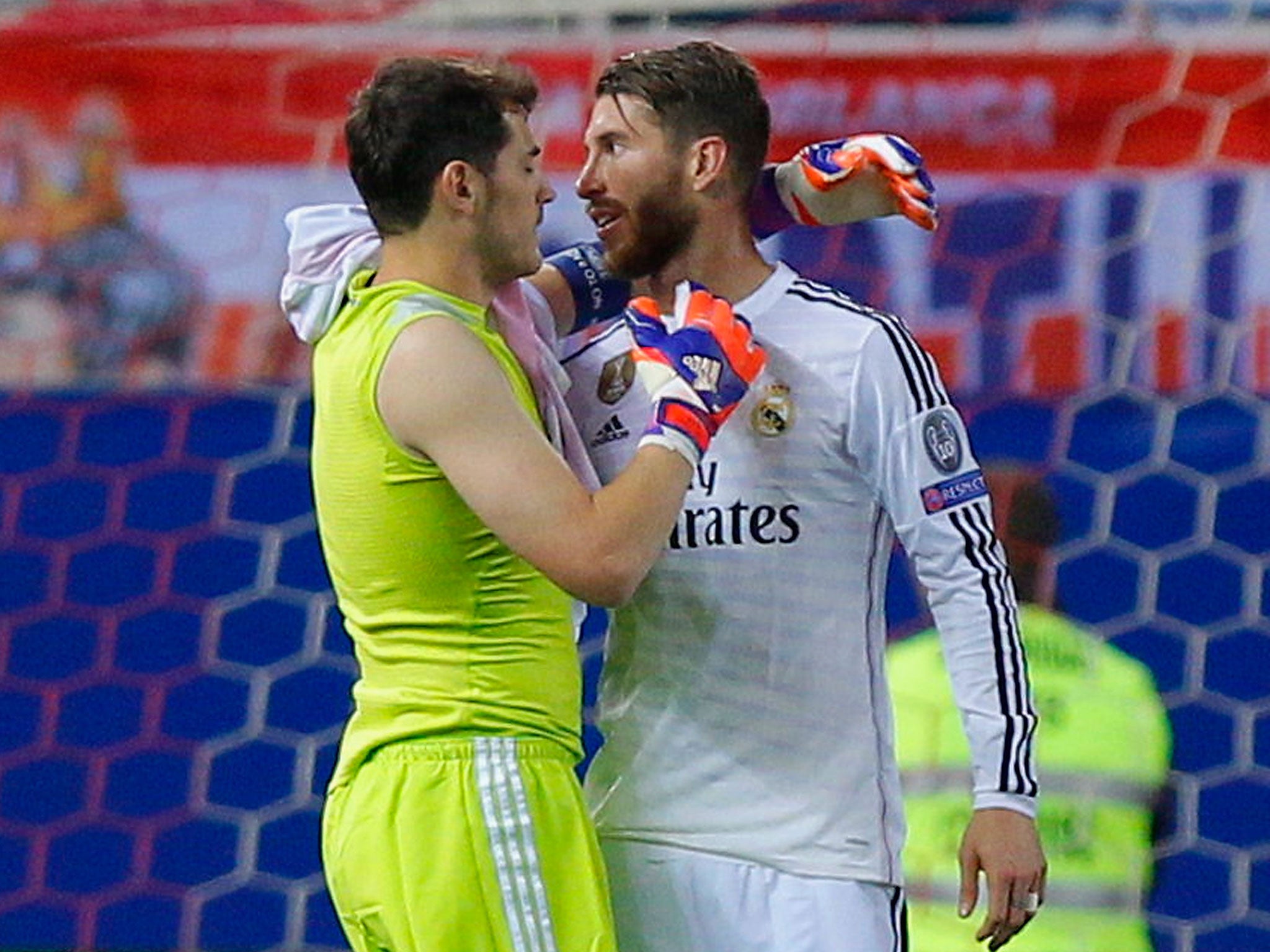 Iker Casillas is congratulated by Sergio Ramos