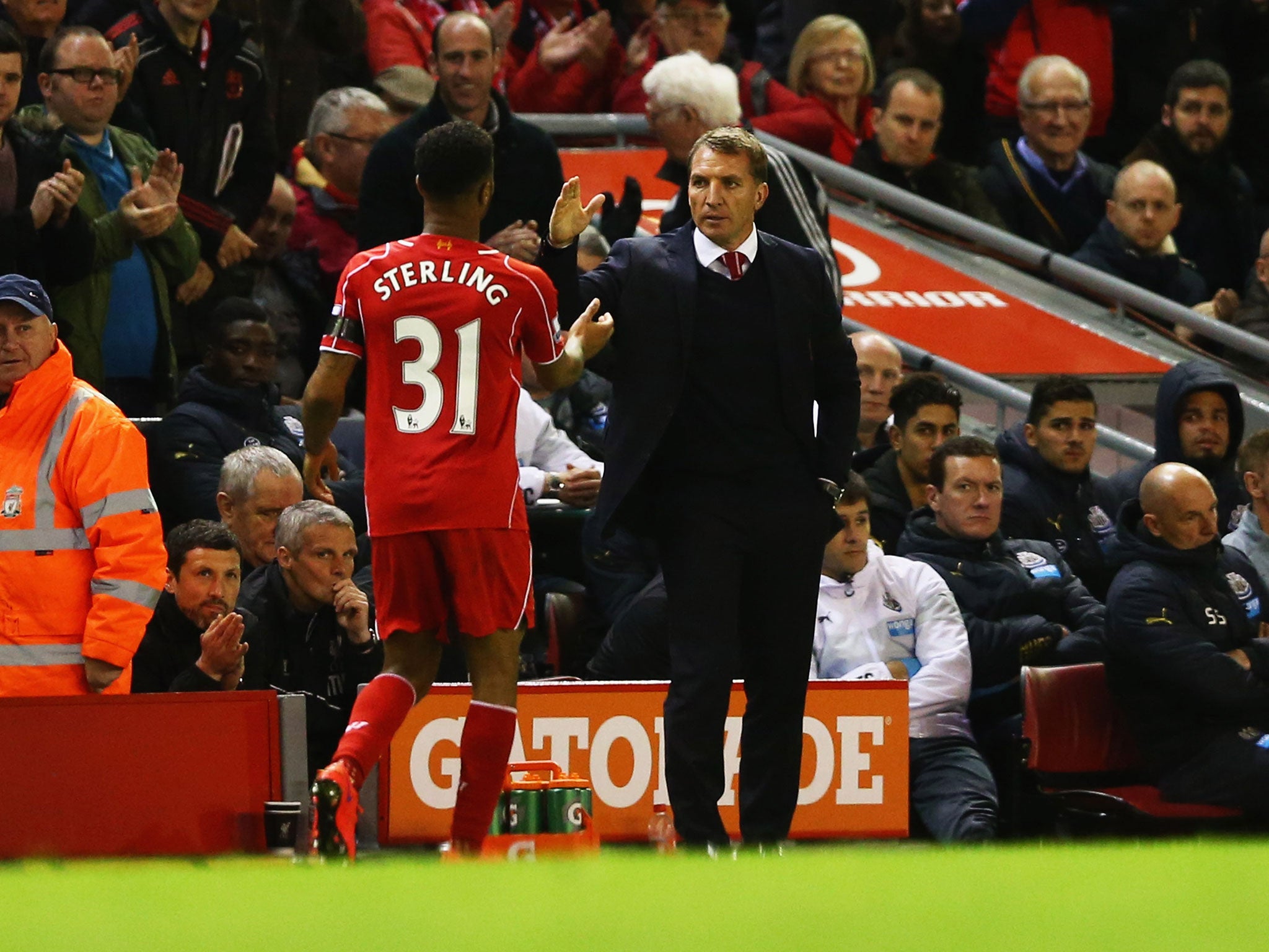 Raheem Sterling shakes hands with Brendan Rodgers