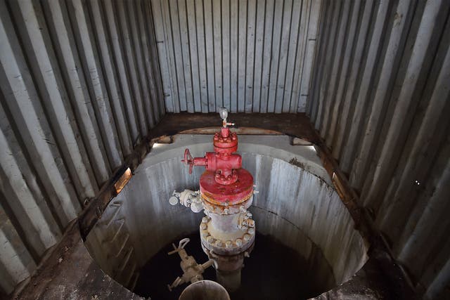A capped oil well sits in a container at Horse Hill well, the centre of last week's discovery